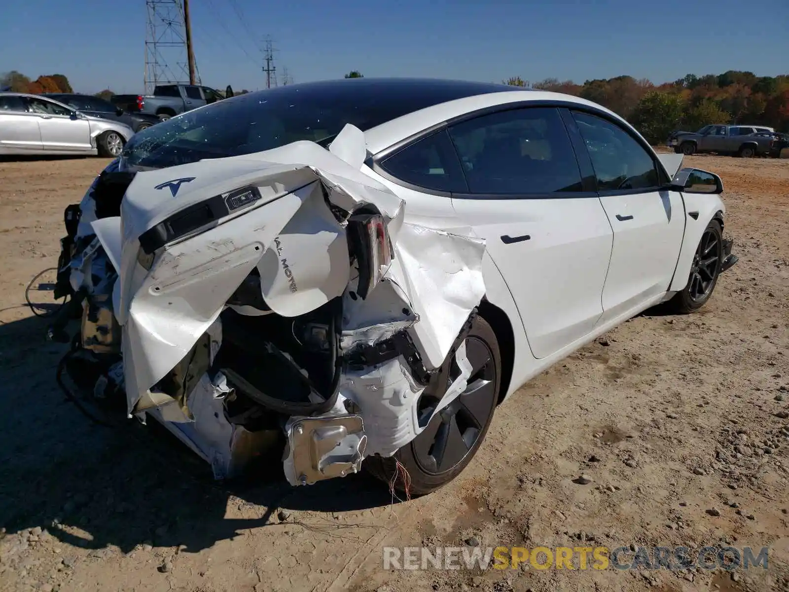 4 Photograph of a damaged car 5YJ3E1EB2MF993023 TESLA MODEL 3 2021