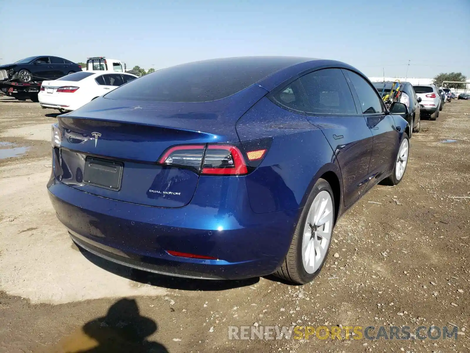 4 Photograph of a damaged car 5YJ3E1EB2MF997282 TESLA MODEL 3 2021