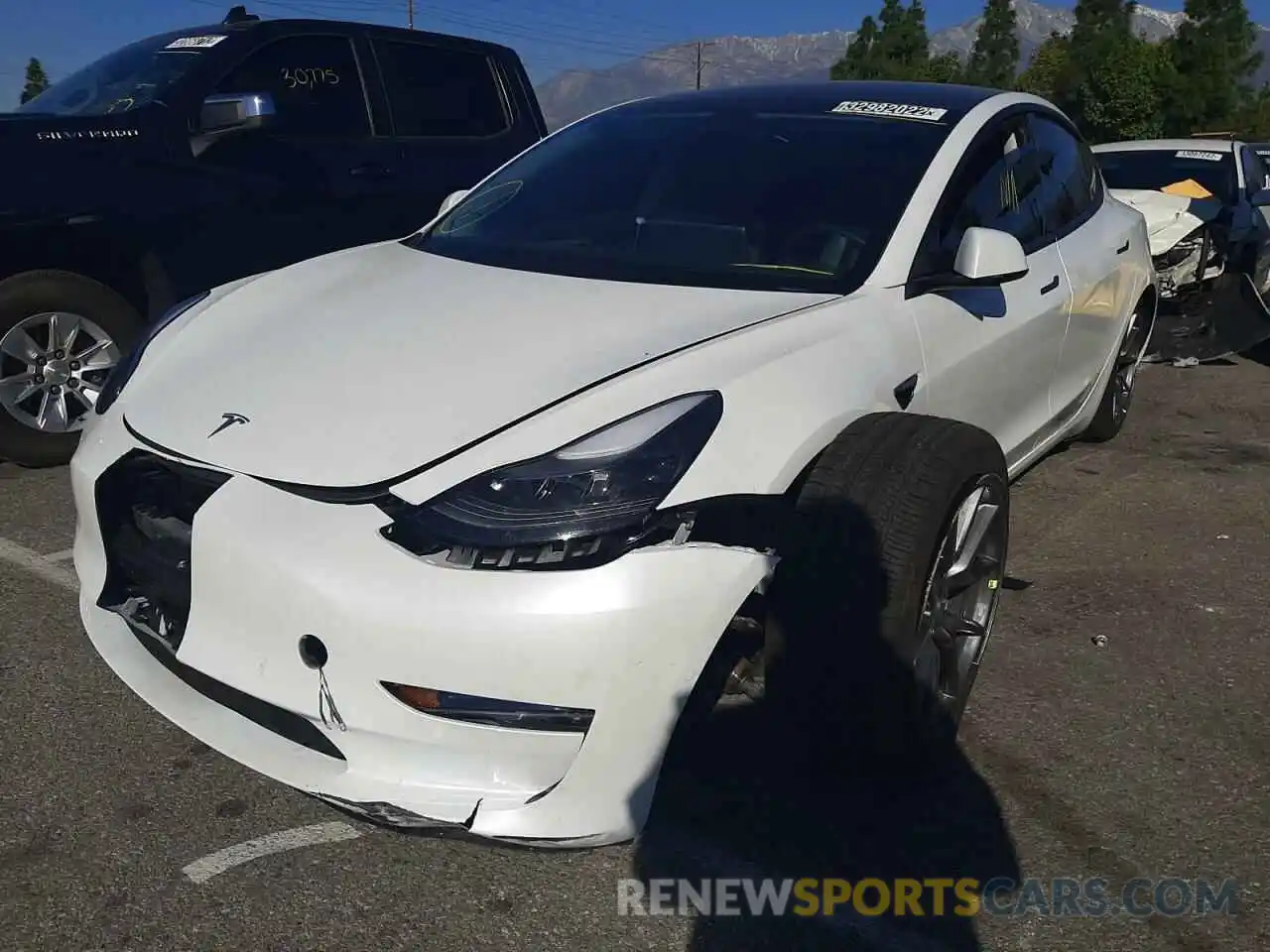 2 Photograph of a damaged car 5YJ3E1EB3MF006896 TESLA MODEL 3 2021