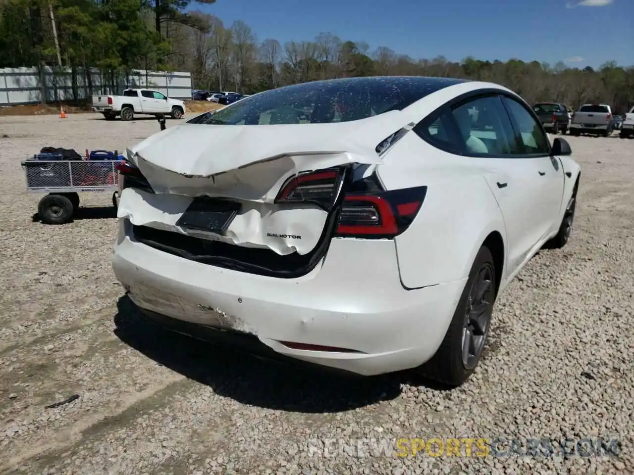 4 Photograph of a damaged car 5YJ3E1EB3MF035704 TESLA MODEL 3 2021