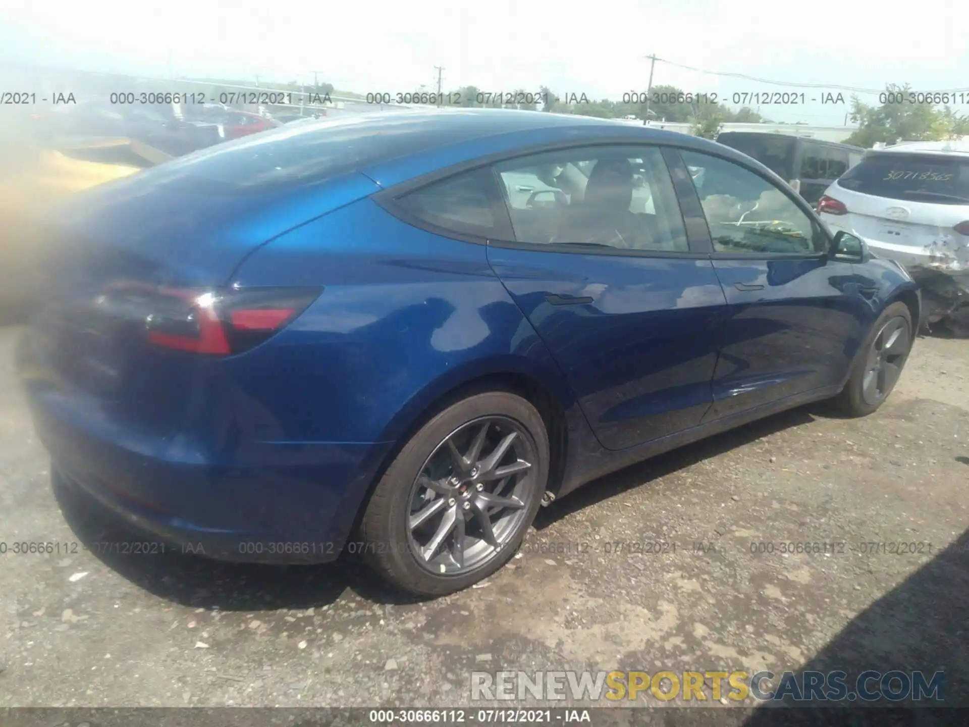 4 Photograph of a damaged car 5YJ3E1EB3MF836830 TESLA MODEL 3 2021