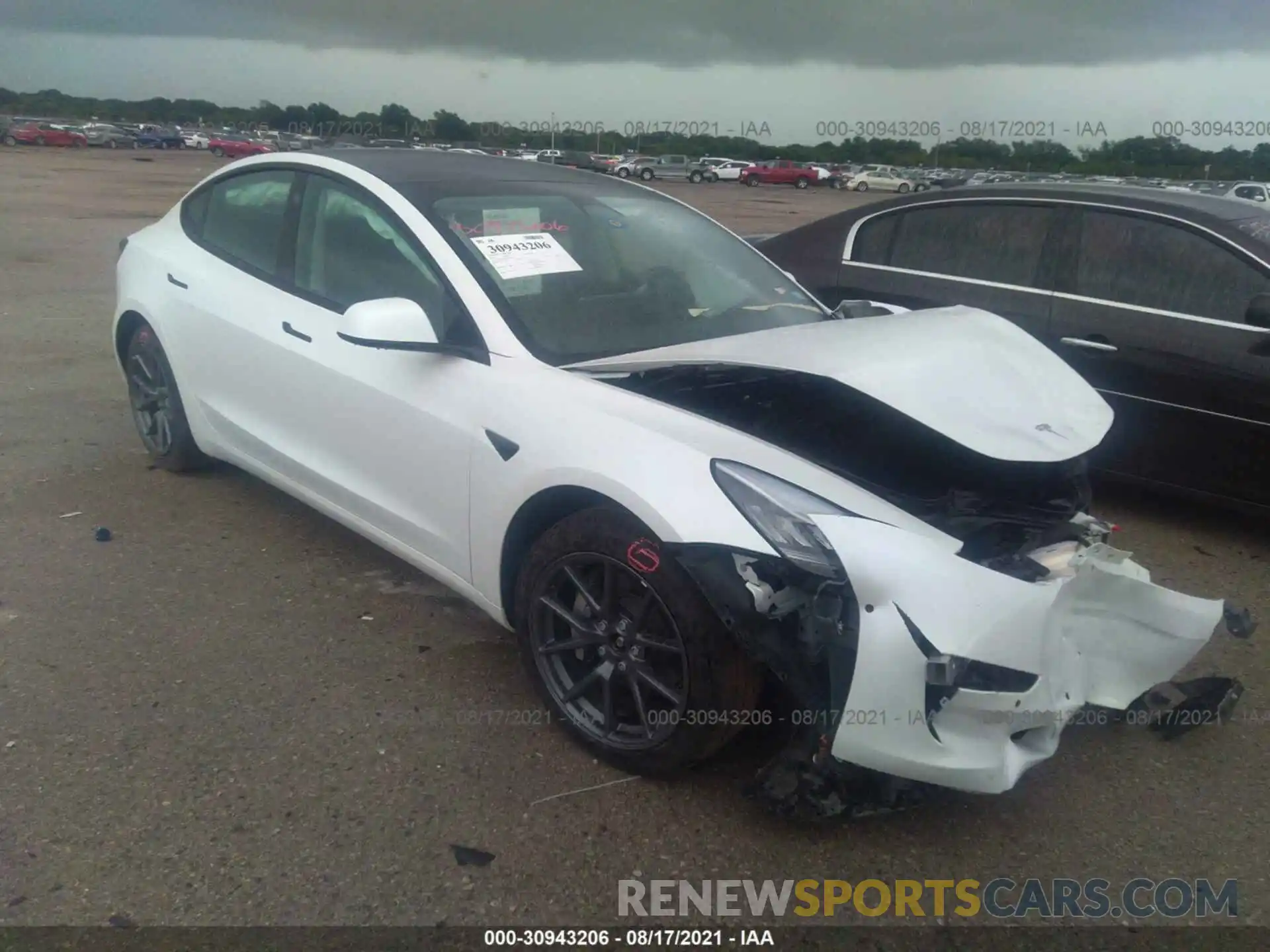 1 Photograph of a damaged car 5YJ3E1EB3MF852977 TESLA MODEL 3 2021