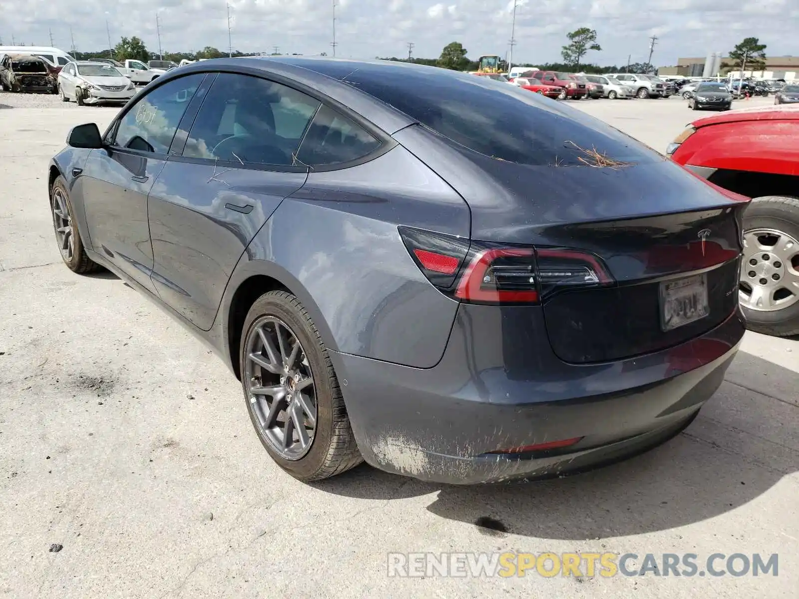 3 Photograph of a damaged car 5YJ3E1EB3MF858620 TESLA MODEL 3 2021