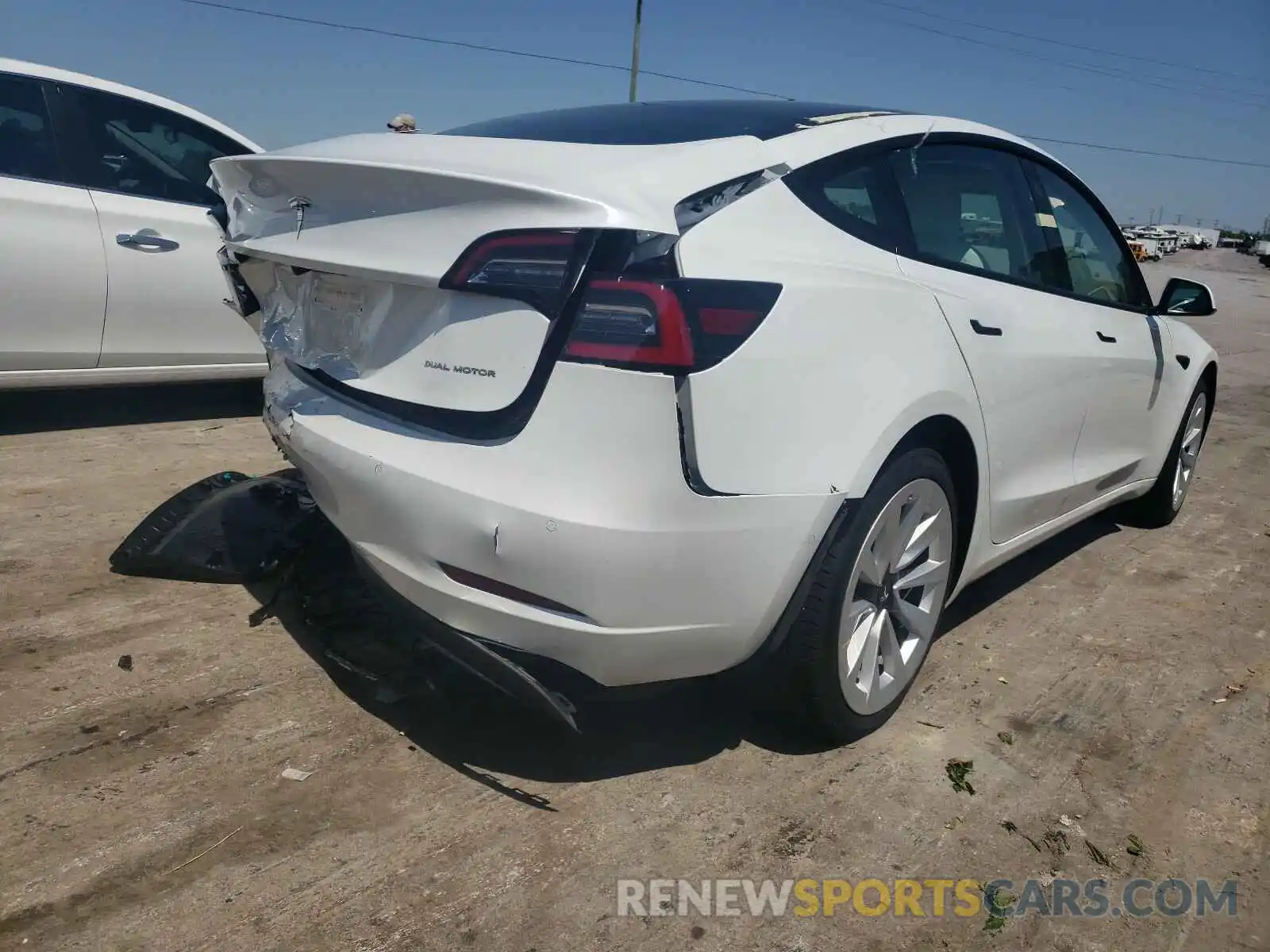 4 Photograph of a damaged car 5YJ3E1EB3MF860528 TESLA MODEL 3 2021