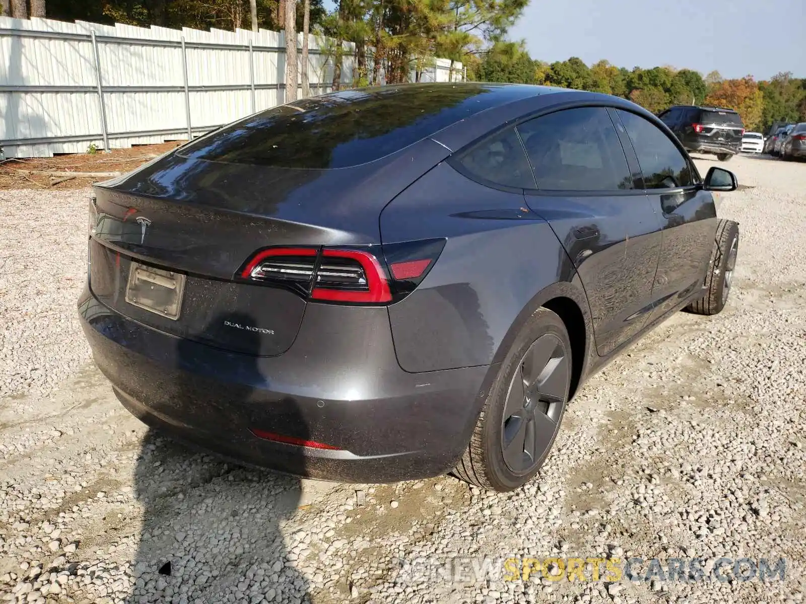 4 Photograph of a damaged car 5YJ3E1EB3MF869410 TESLA MODEL 3 2021