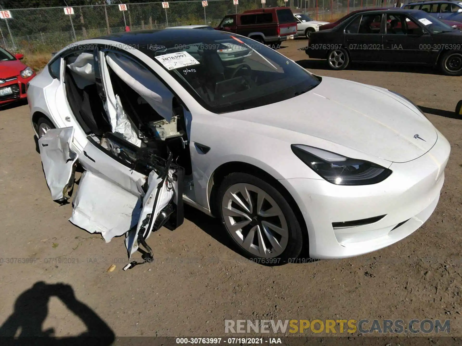 1 Photograph of a damaged car 5YJ3E1EB3MF936751 TESLA MODEL 3 2021