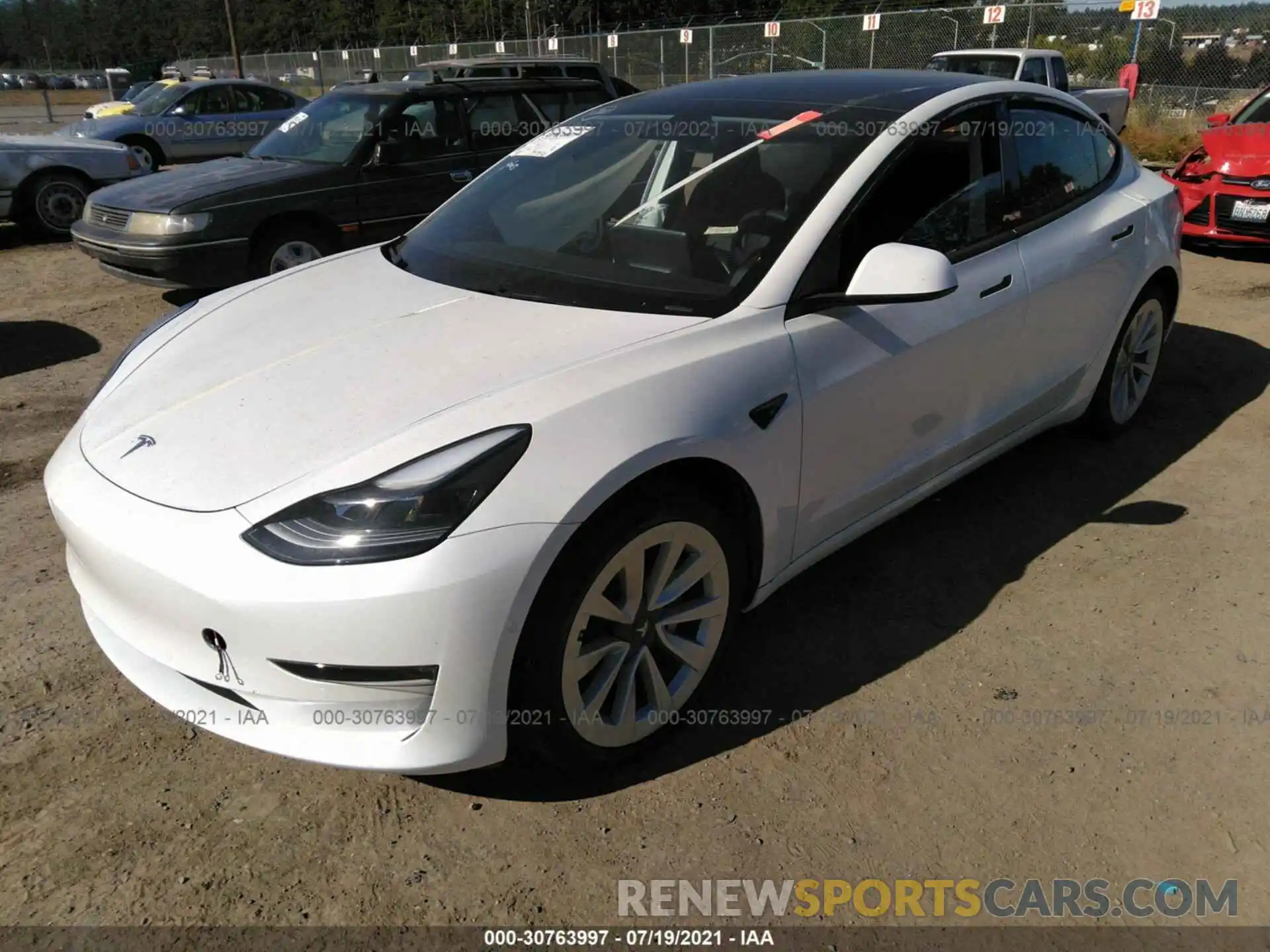 2 Photograph of a damaged car 5YJ3E1EB3MF936751 TESLA MODEL 3 2021