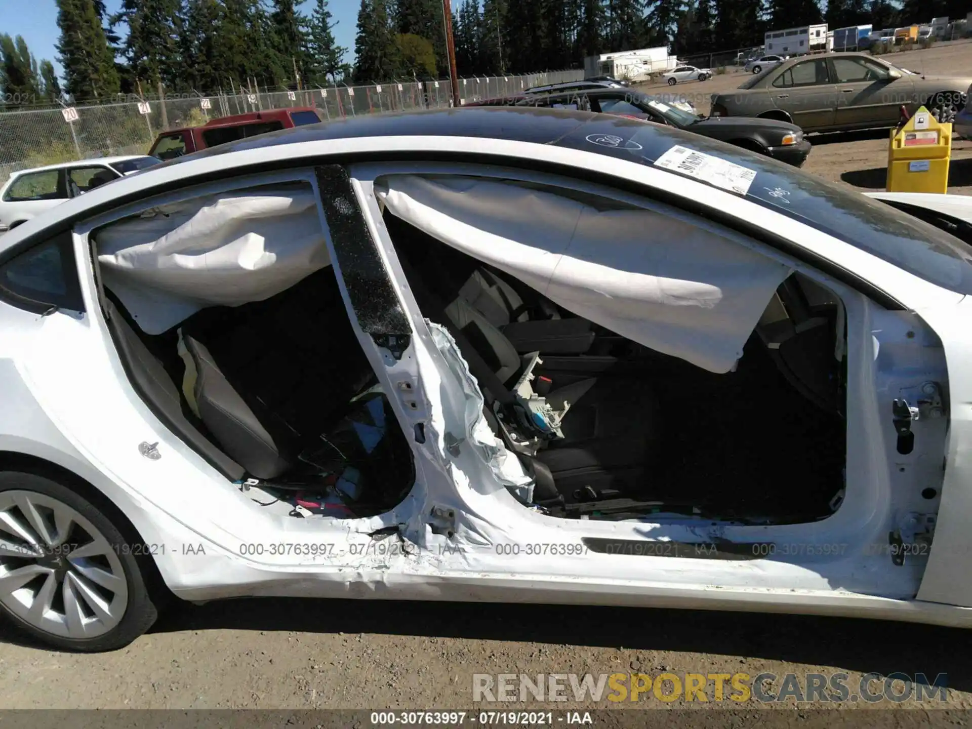 6 Photograph of a damaged car 5YJ3E1EB3MF936751 TESLA MODEL 3 2021