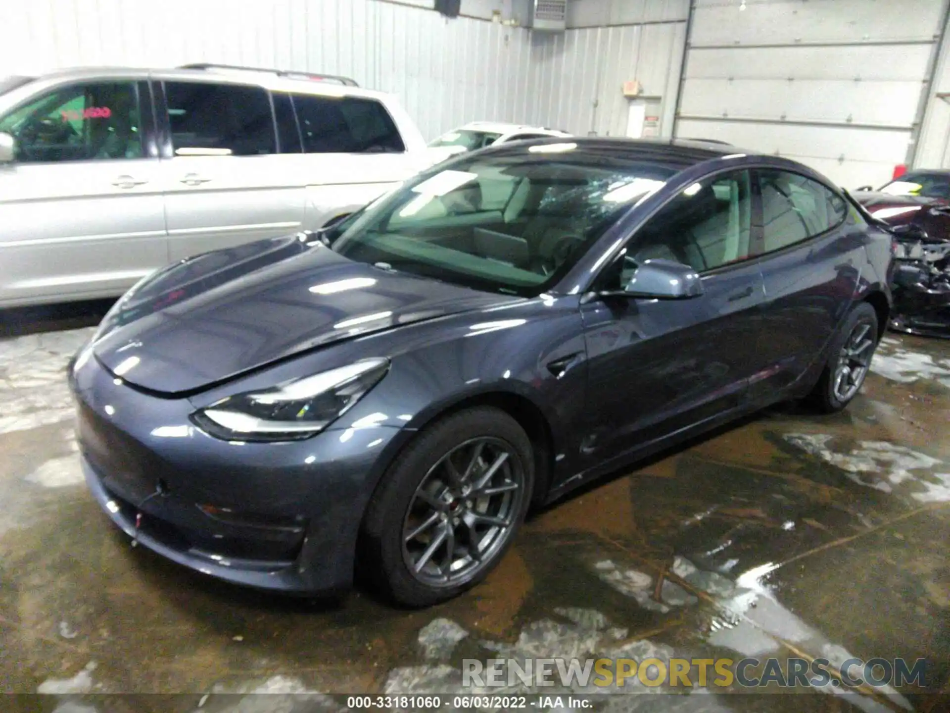 2 Photograph of a damaged car 5YJ3E1EB3MF979213 TESLA MODEL 3 2021