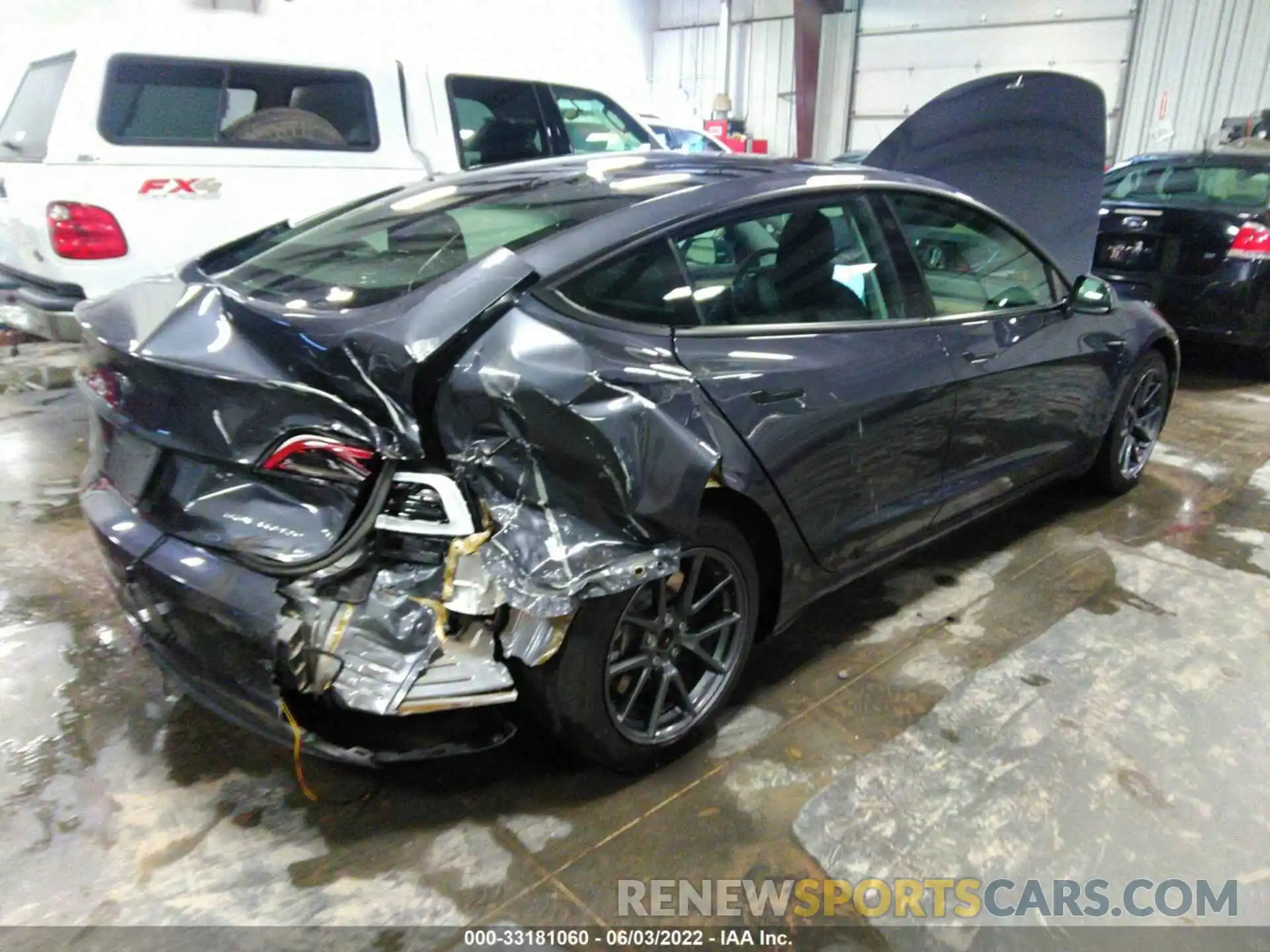 4 Photograph of a damaged car 5YJ3E1EB3MF979213 TESLA MODEL 3 2021