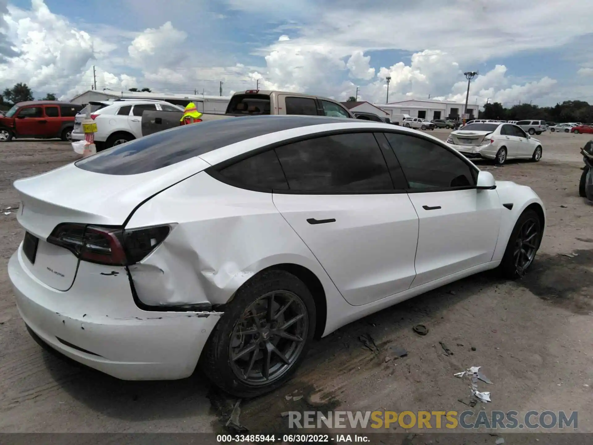 4 Photograph of a damaged car 5YJ3E1EB3MF980619 TESLA MODEL 3 2021