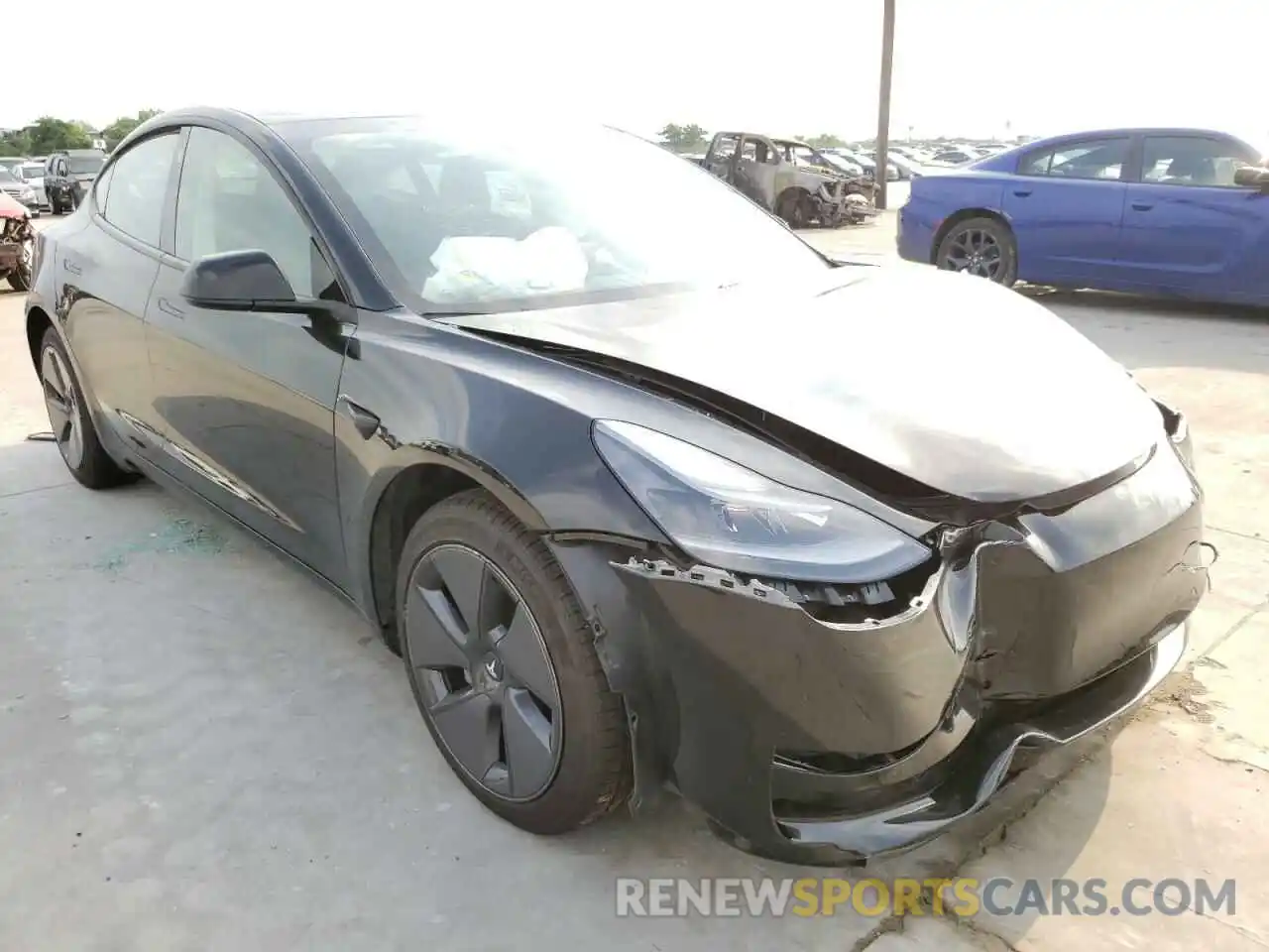 1 Photograph of a damaged car 5YJ3E1EB3MF992141 TESLA MODEL 3 2021