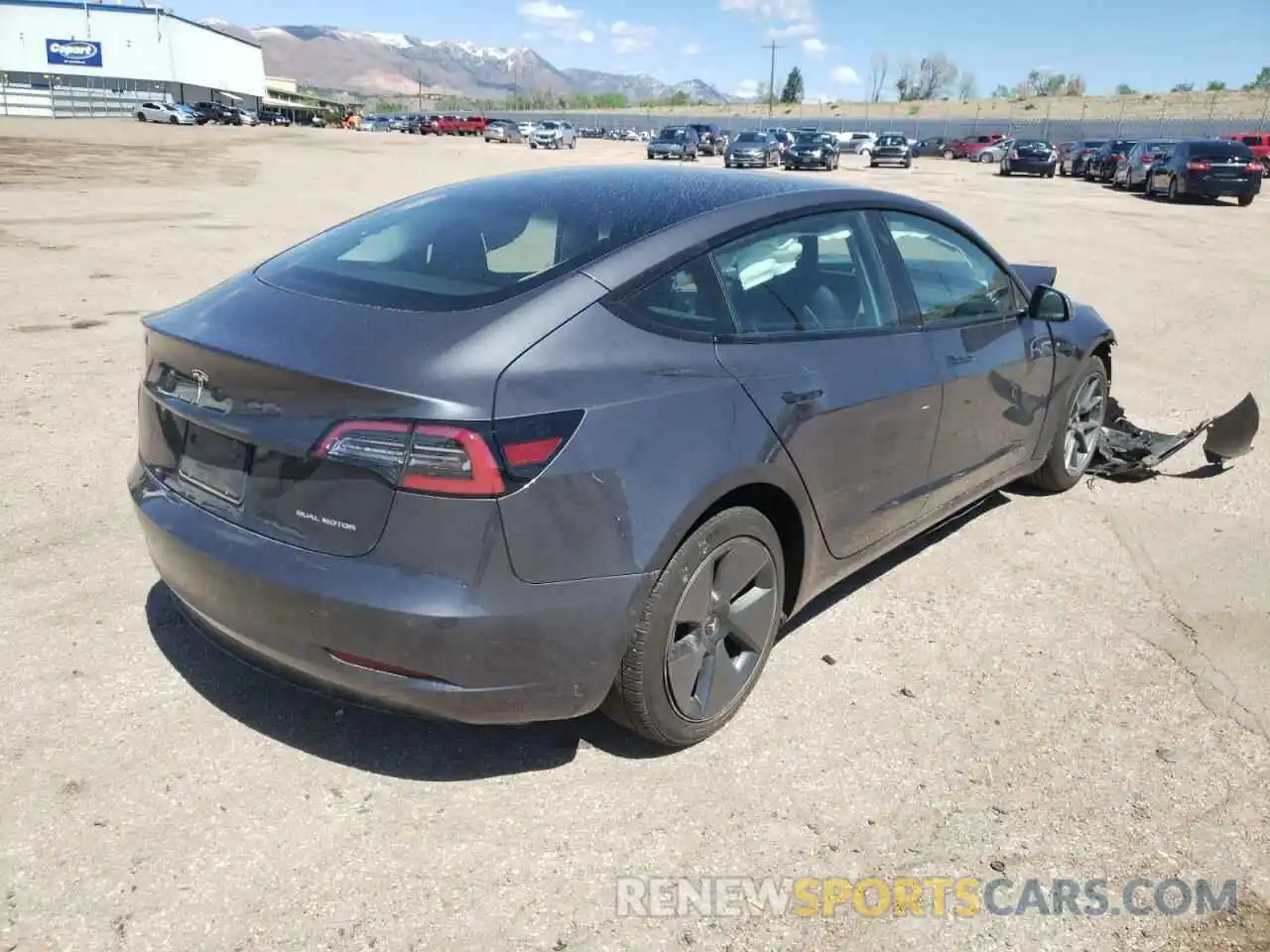 4 Photograph of a damaged car 5YJ3E1EB3MF997808 TESLA MODEL 3 2021