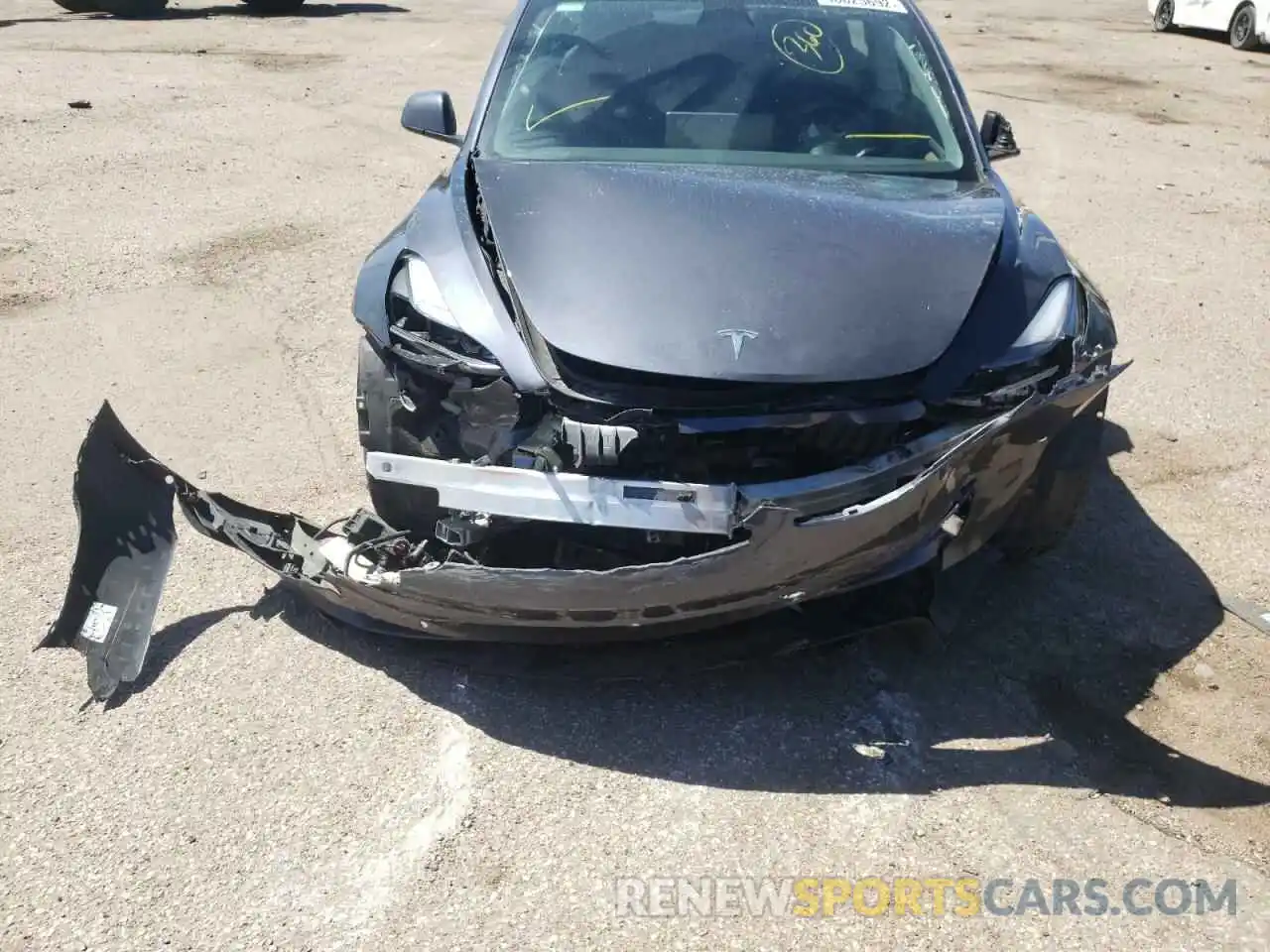 9 Photograph of a damaged car 5YJ3E1EB3MF997808 TESLA MODEL 3 2021