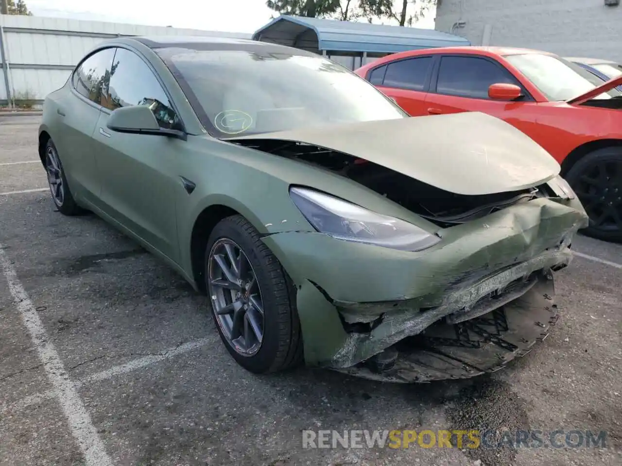 1 Photograph of a damaged car 5YJ3E1EB4MF001173 TESLA MODEL 3 2021