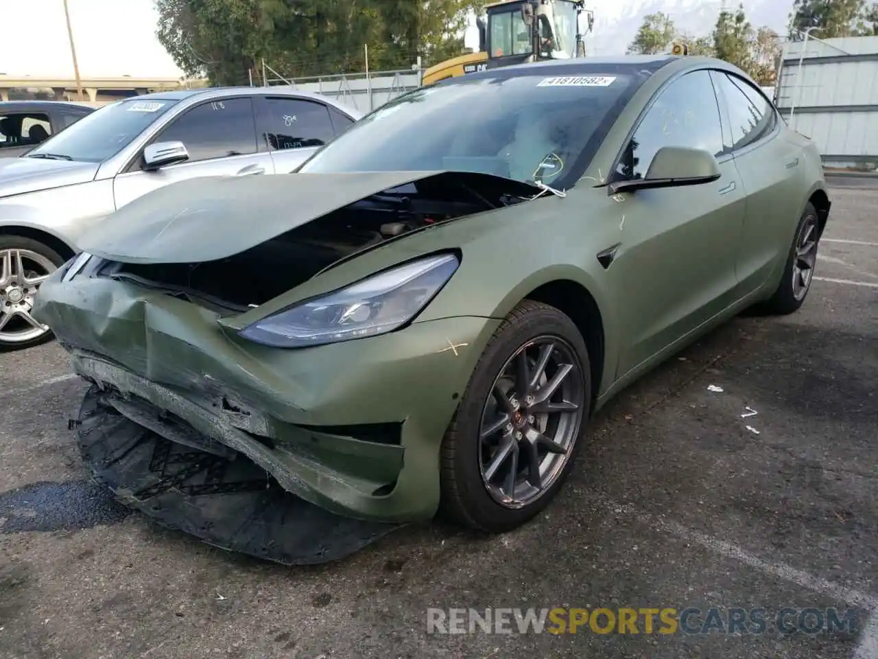 2 Photograph of a damaged car 5YJ3E1EB4MF001173 TESLA MODEL 3 2021