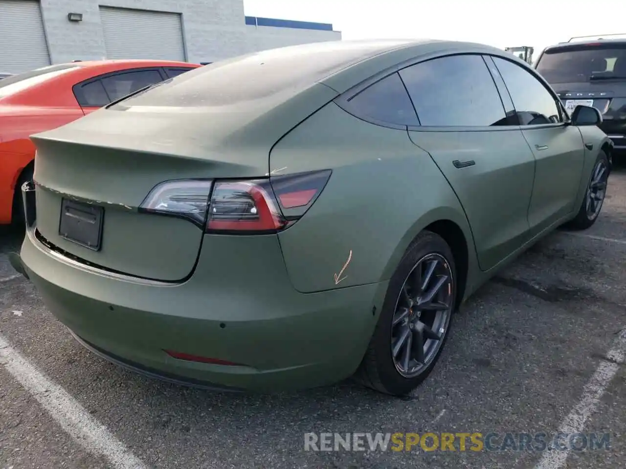 4 Photograph of a damaged car 5YJ3E1EB4MF001173 TESLA MODEL 3 2021