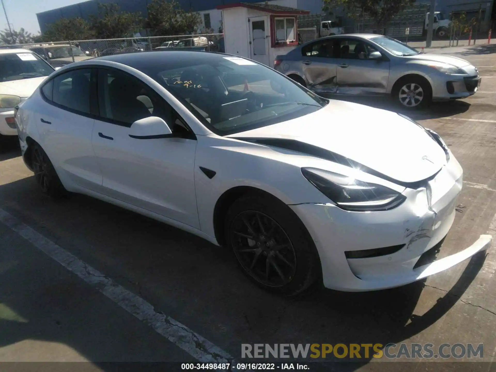 1 Photograph of a damaged car 5YJ3E1EB4MF036327 TESLA MODEL 3 2021