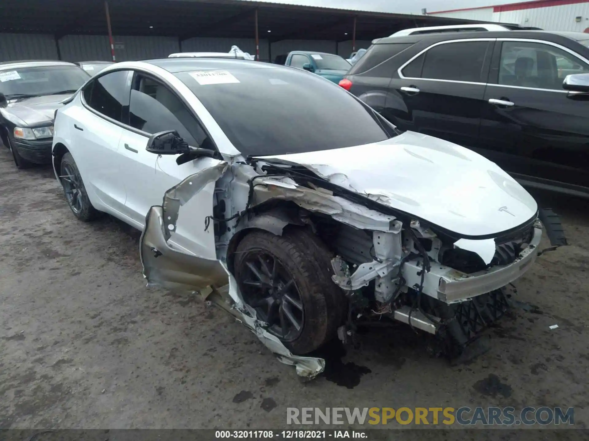 1 Photograph of a damaged car 5YJ3E1EB4MF083793 TESLA MODEL 3 2021