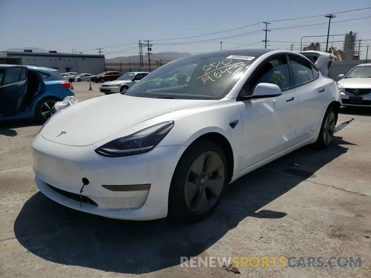 2 Photograph of a damaged car 5YJ3E1EB4MF099220 TESLA MODEL 3 2021