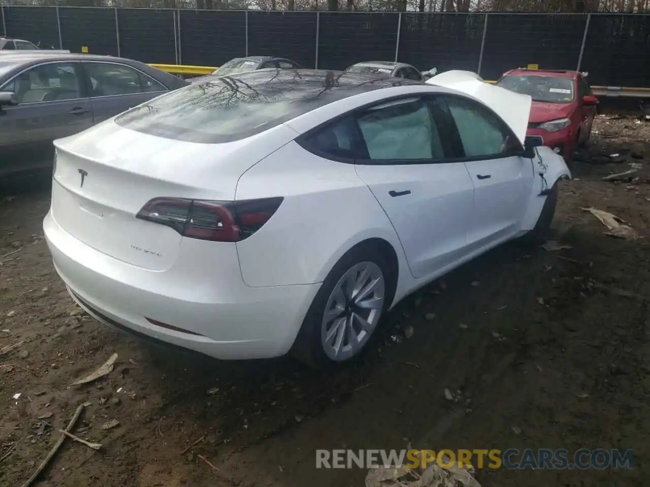 4 Photograph of a damaged car 5YJ3E1EB4MF101080 TESLA MODEL 3 2021