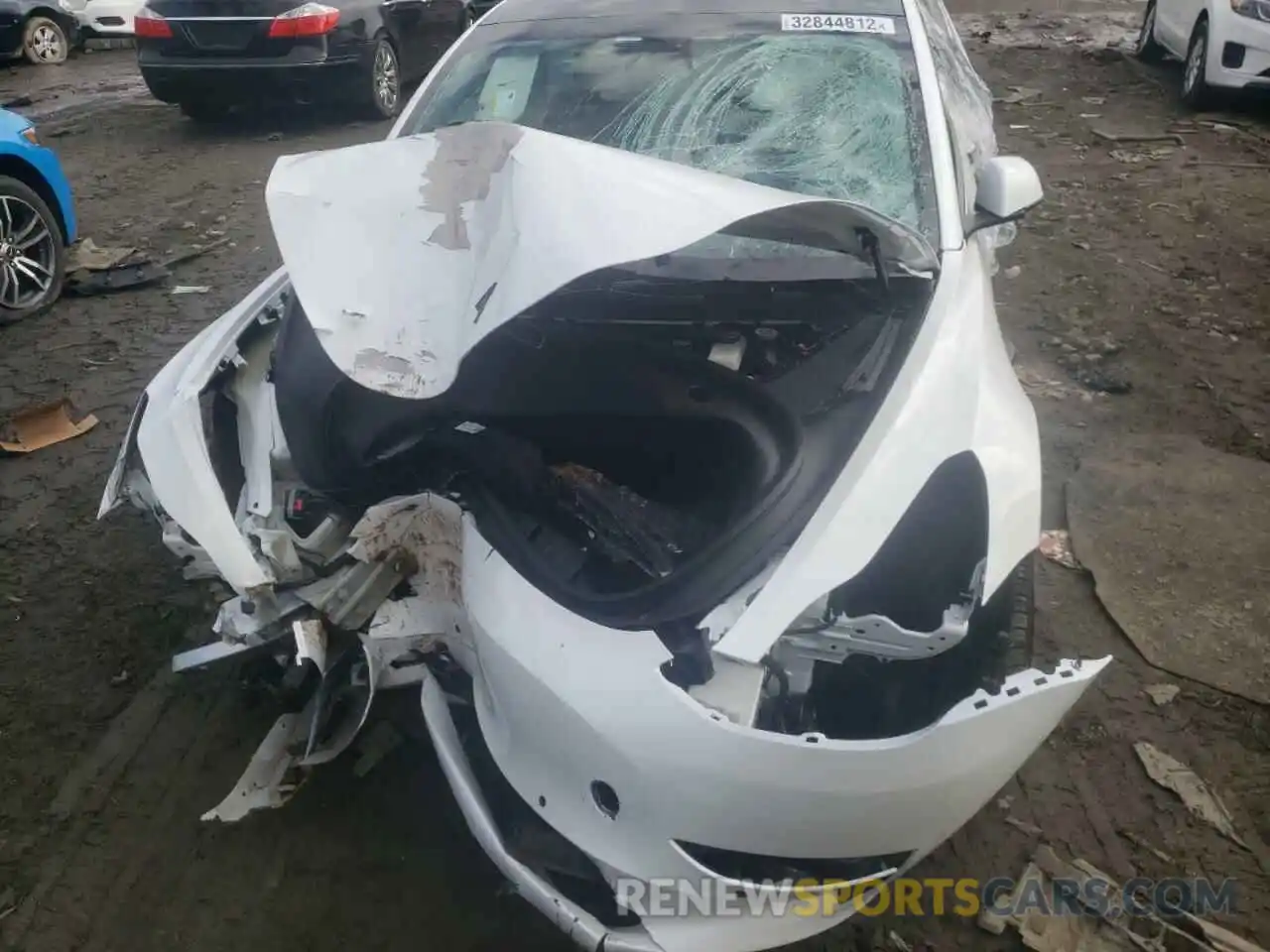 9 Photograph of a damaged car 5YJ3E1EB4MF101080 TESLA MODEL 3 2021