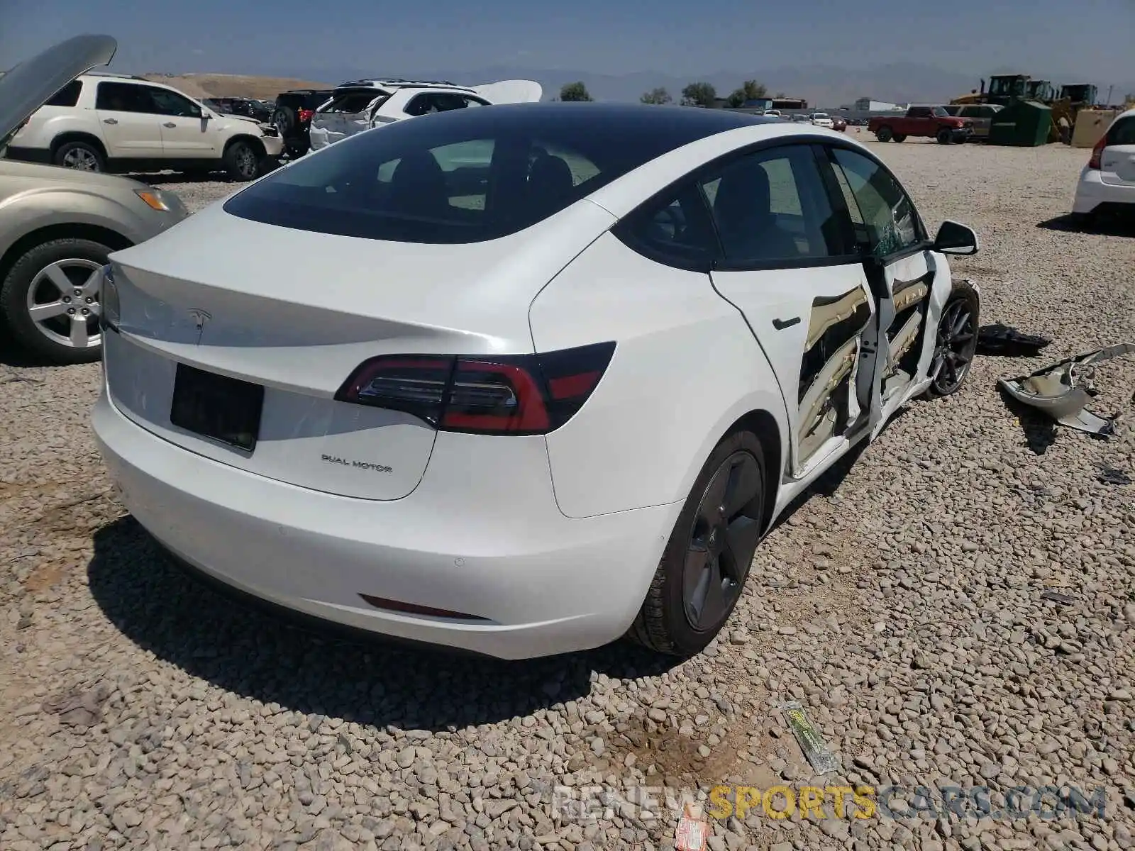 4 Фотография поврежденного автомобиля 5YJ3E1EB4MF848002 TESLA MODEL 3 2021