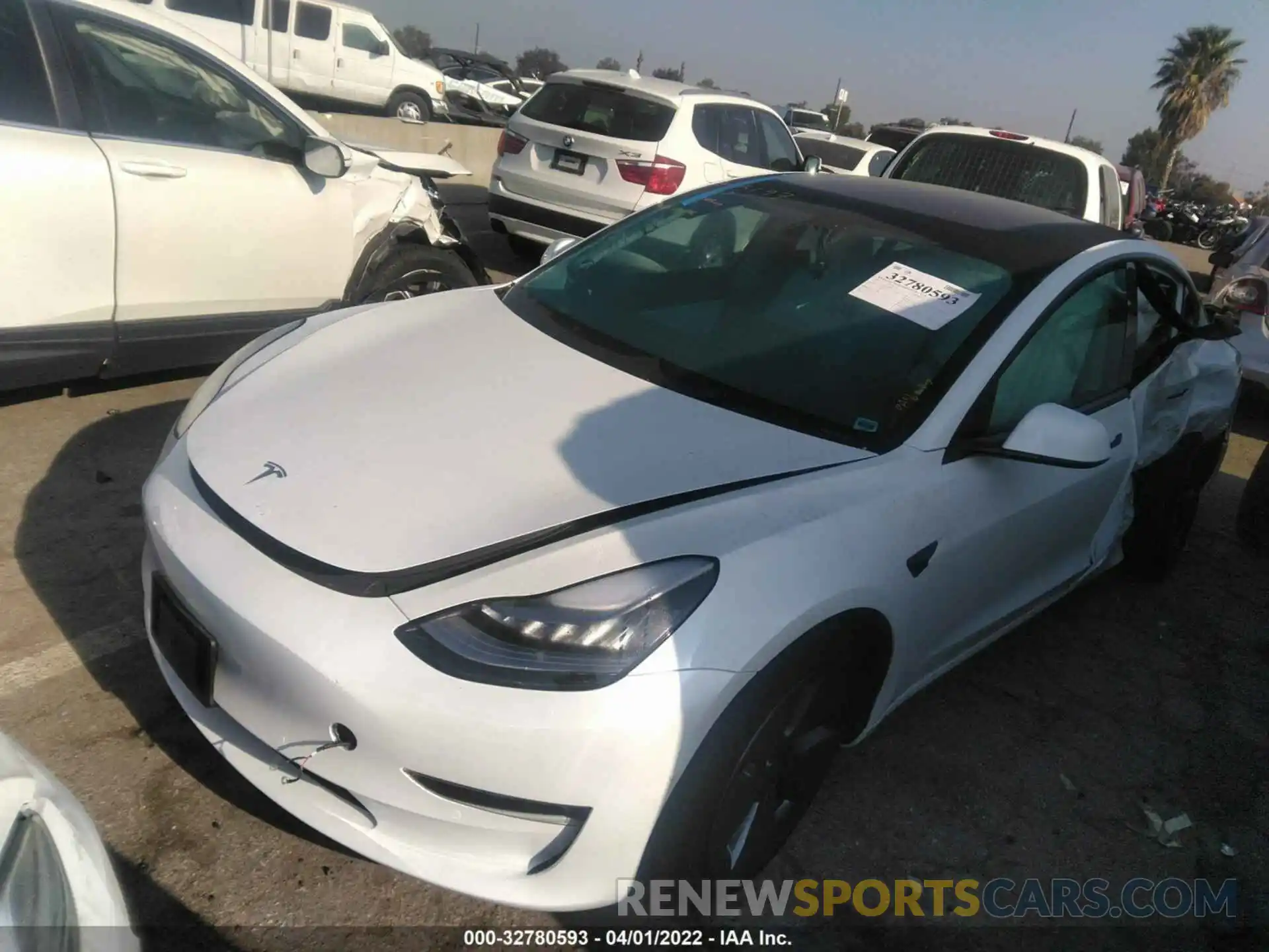 2 Photograph of a damaged car 5YJ3E1EB4MF852793 TESLA MODEL 3 2021