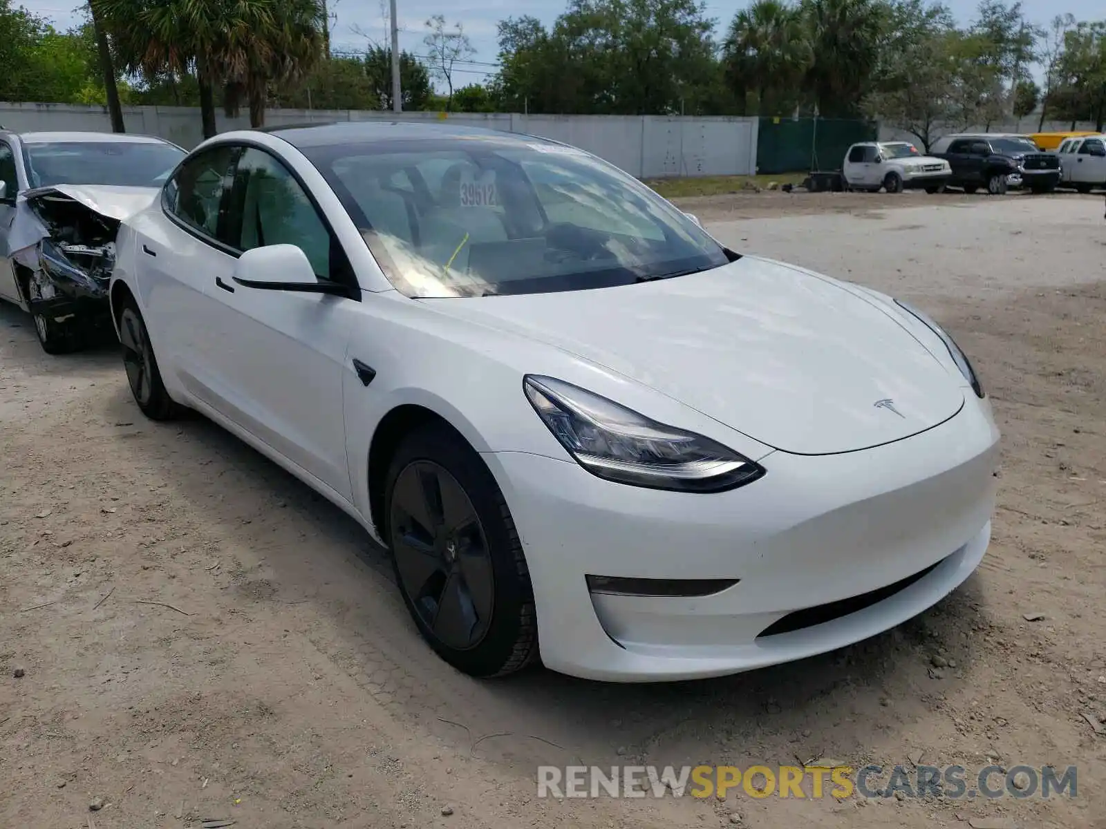 1 Photograph of a damaged car 5YJ3E1EB4MF860263 TESLA MODEL 3 2021