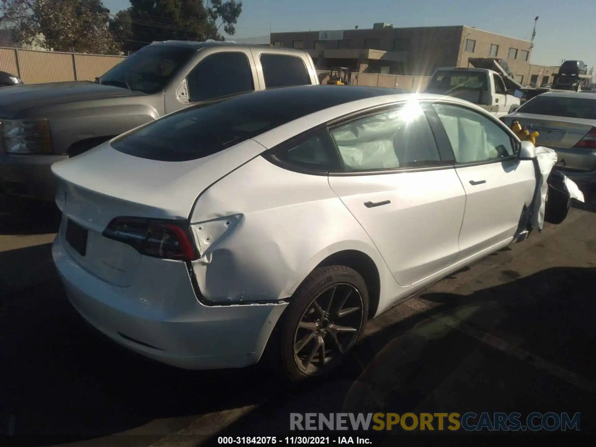 4 Photograph of a damaged car 5YJ3E1EB4MF864653 TESLA MODEL 3 2021