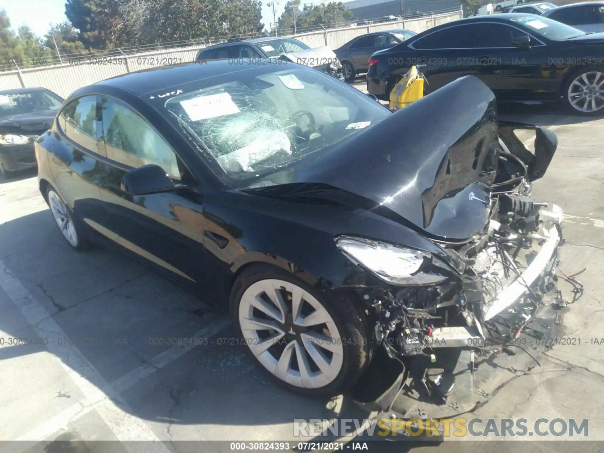 1 Photograph of a damaged car 5YJ3E1EB4MF877340 TESLA MODEL 3 2021