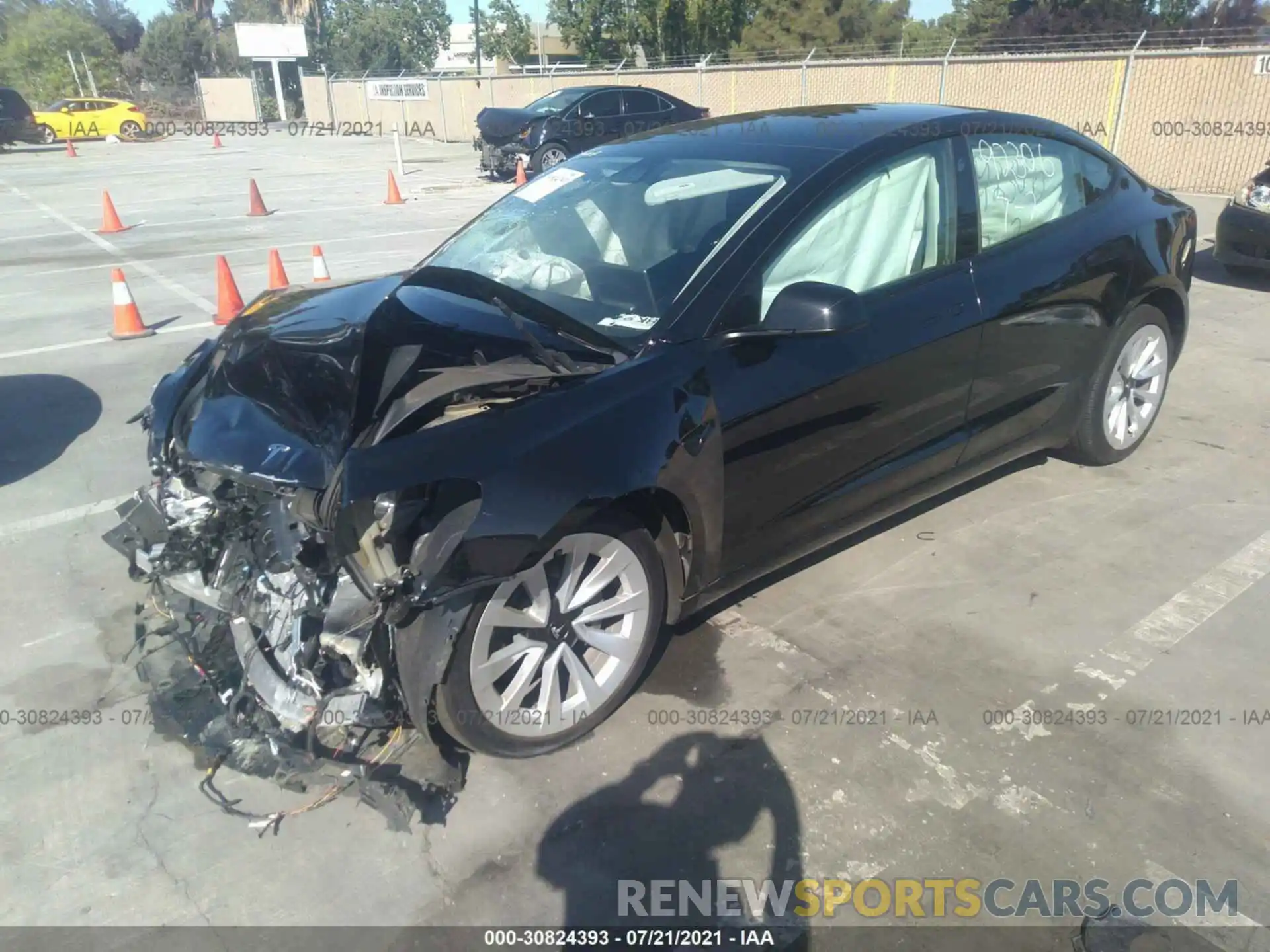 2 Photograph of a damaged car 5YJ3E1EB4MF877340 TESLA MODEL 3 2021