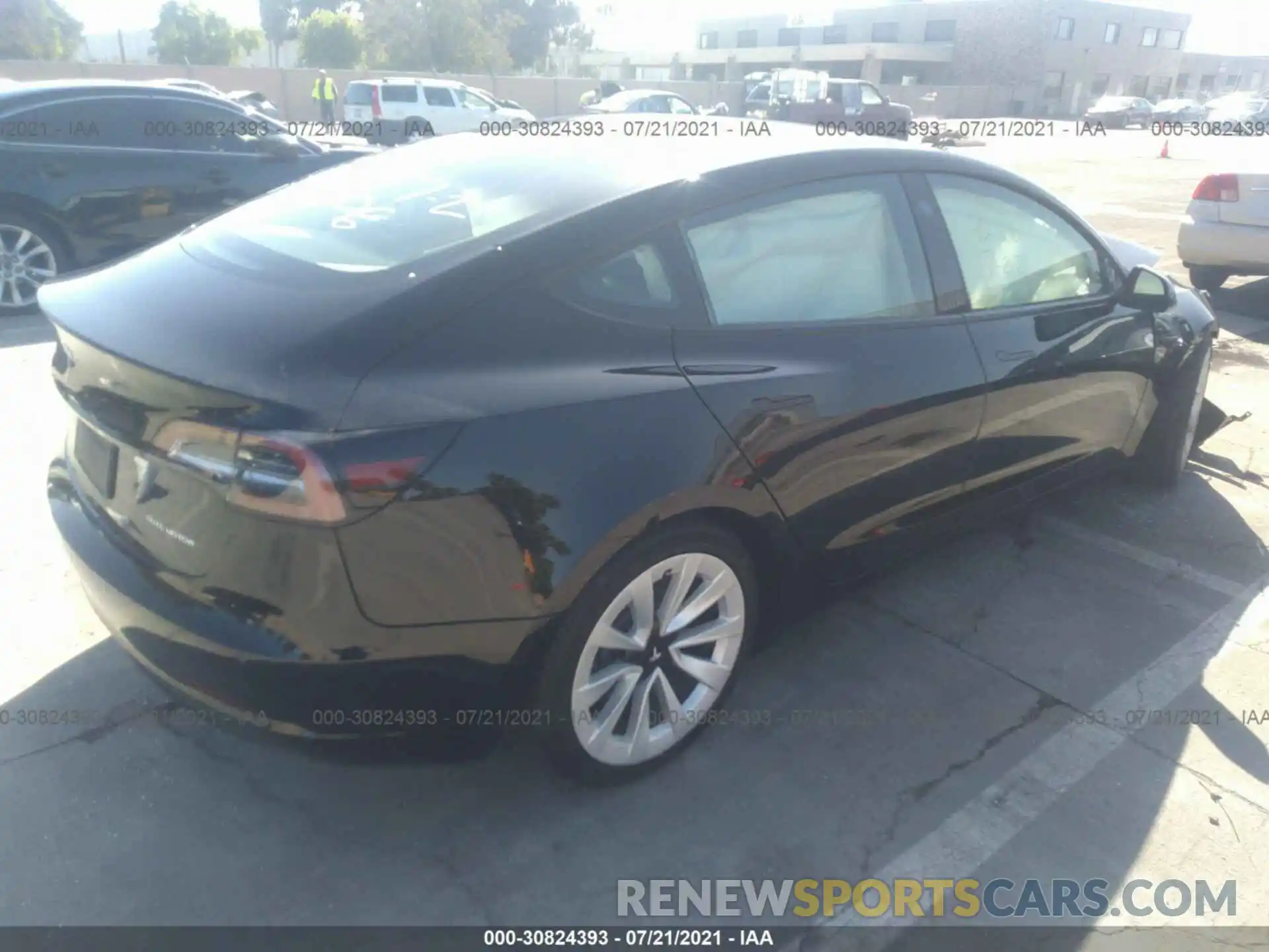 4 Photograph of a damaged car 5YJ3E1EB4MF877340 TESLA MODEL 3 2021