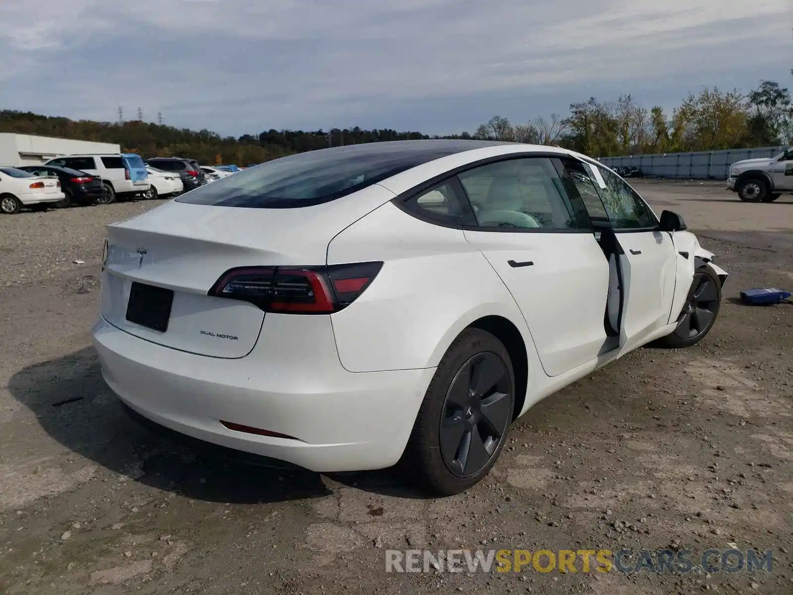 4 Photograph of a damaged car 5YJ3E1EB4MF919229 TESLA MODEL 3 2021