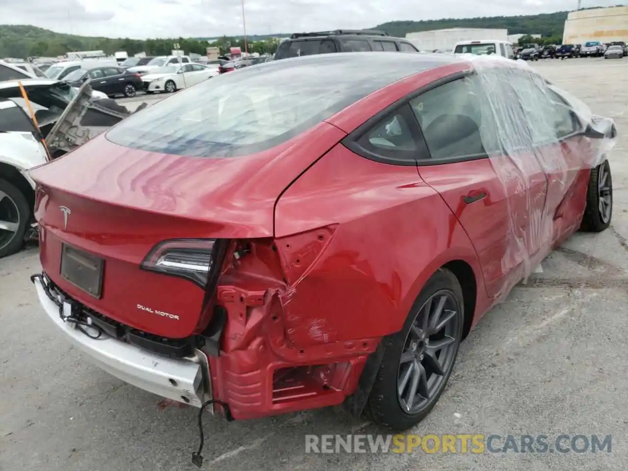 4 Photograph of a damaged car 5YJ3E1EB4MF927069 TESLA MODEL 3 2021