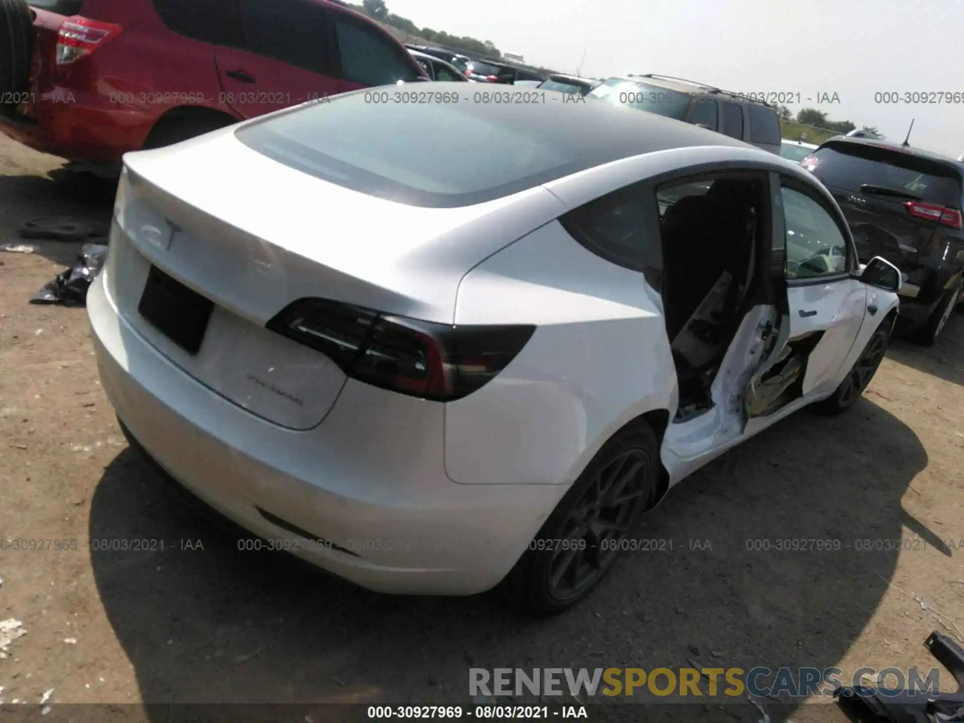 4 Photograph of a damaged car 5YJ3E1EB4MF928321 TESLA MODEL 3 2021