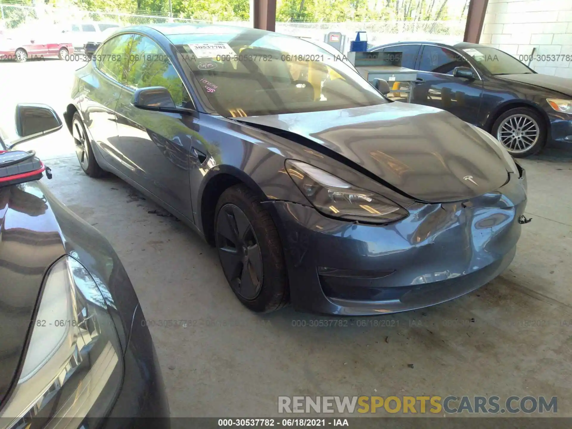 1 Photograph of a damaged car 5YJ3E1EB4MF938380 TESLA MODEL 3 2021