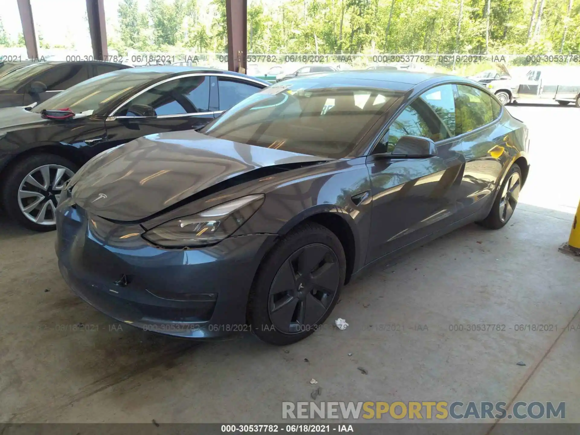 2 Photograph of a damaged car 5YJ3E1EB4MF938380 TESLA MODEL 3 2021