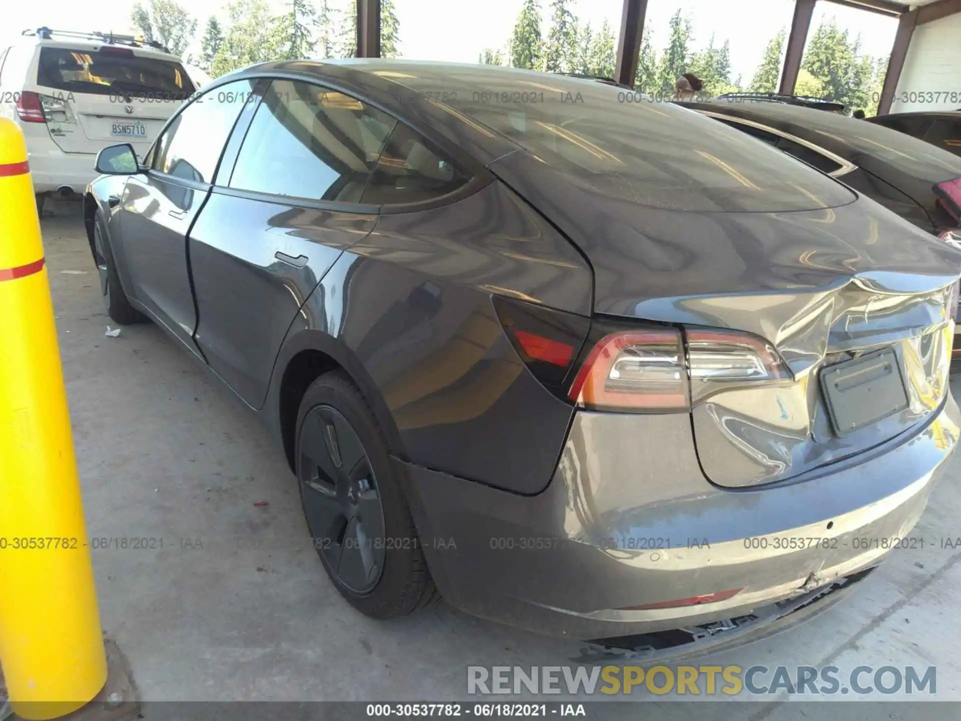 3 Photograph of a damaged car 5YJ3E1EB4MF938380 TESLA MODEL 3 2021