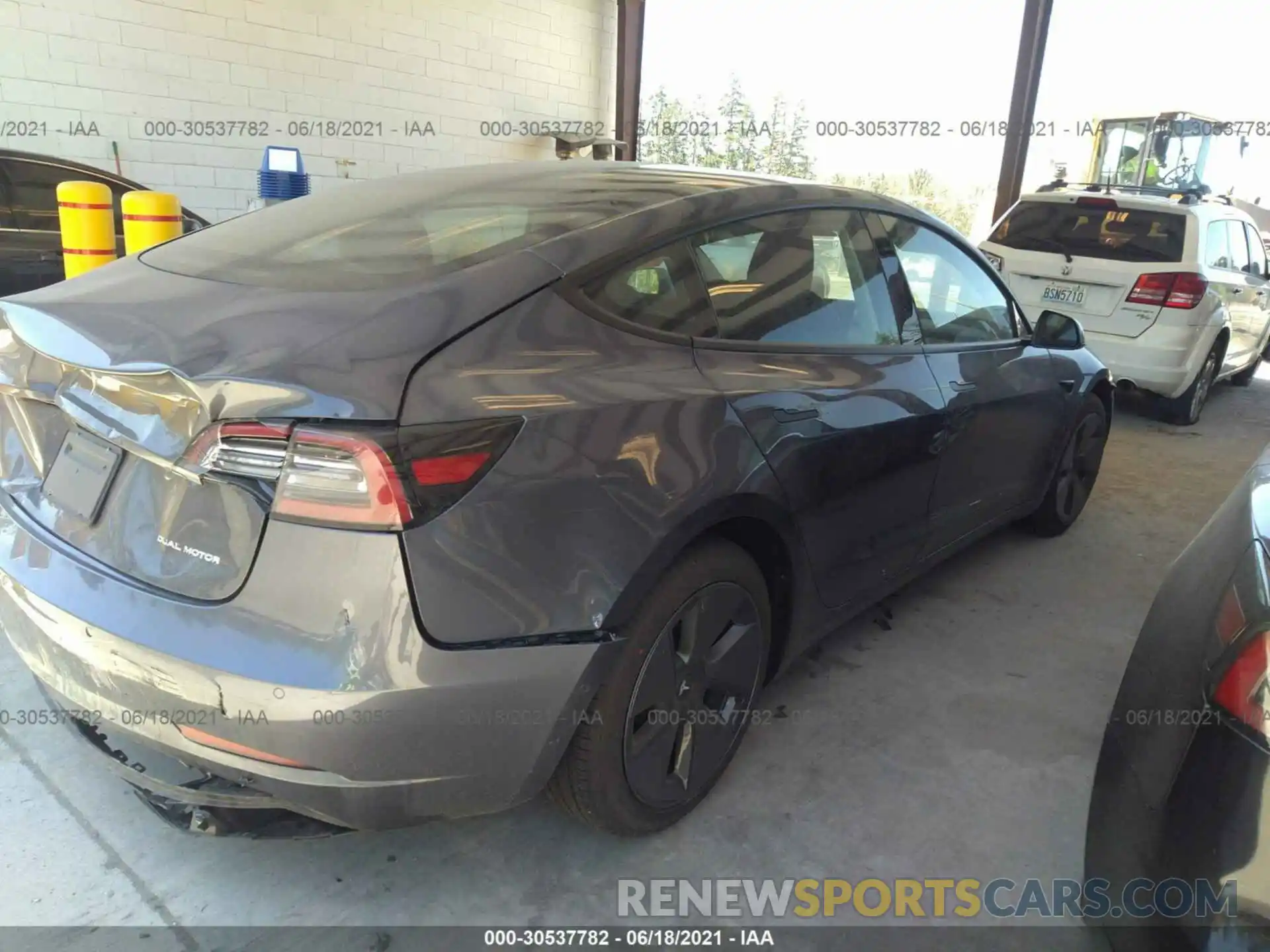 4 Photograph of a damaged car 5YJ3E1EB4MF938380 TESLA MODEL 3 2021