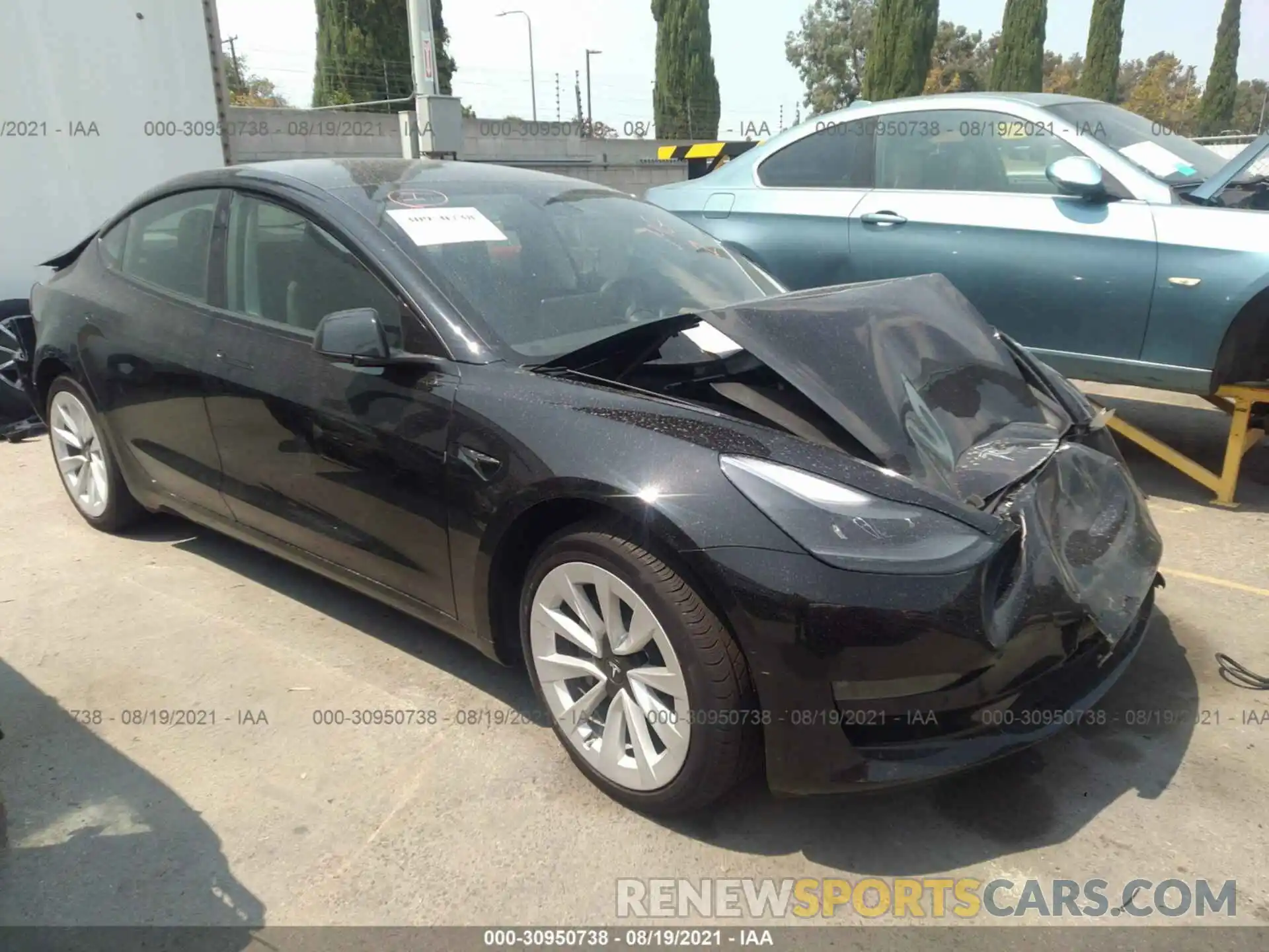 1 Photograph of a damaged car 5YJ3E1EB4MF974960 TESLA MODEL 3 2021