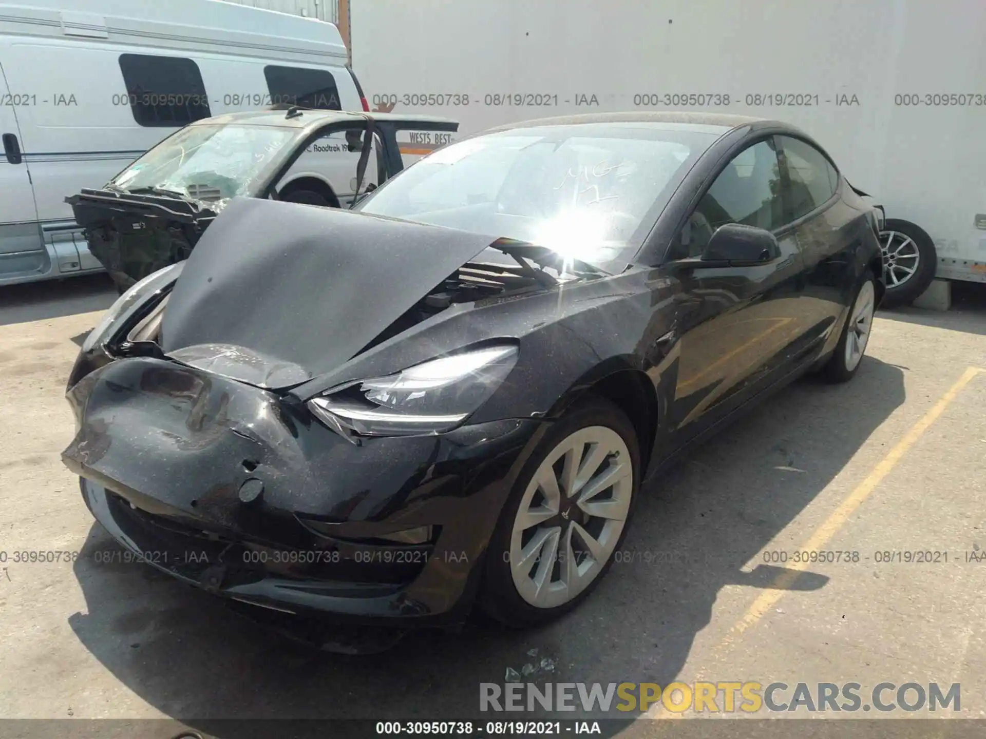 2 Photograph of a damaged car 5YJ3E1EB4MF974960 TESLA MODEL 3 2021