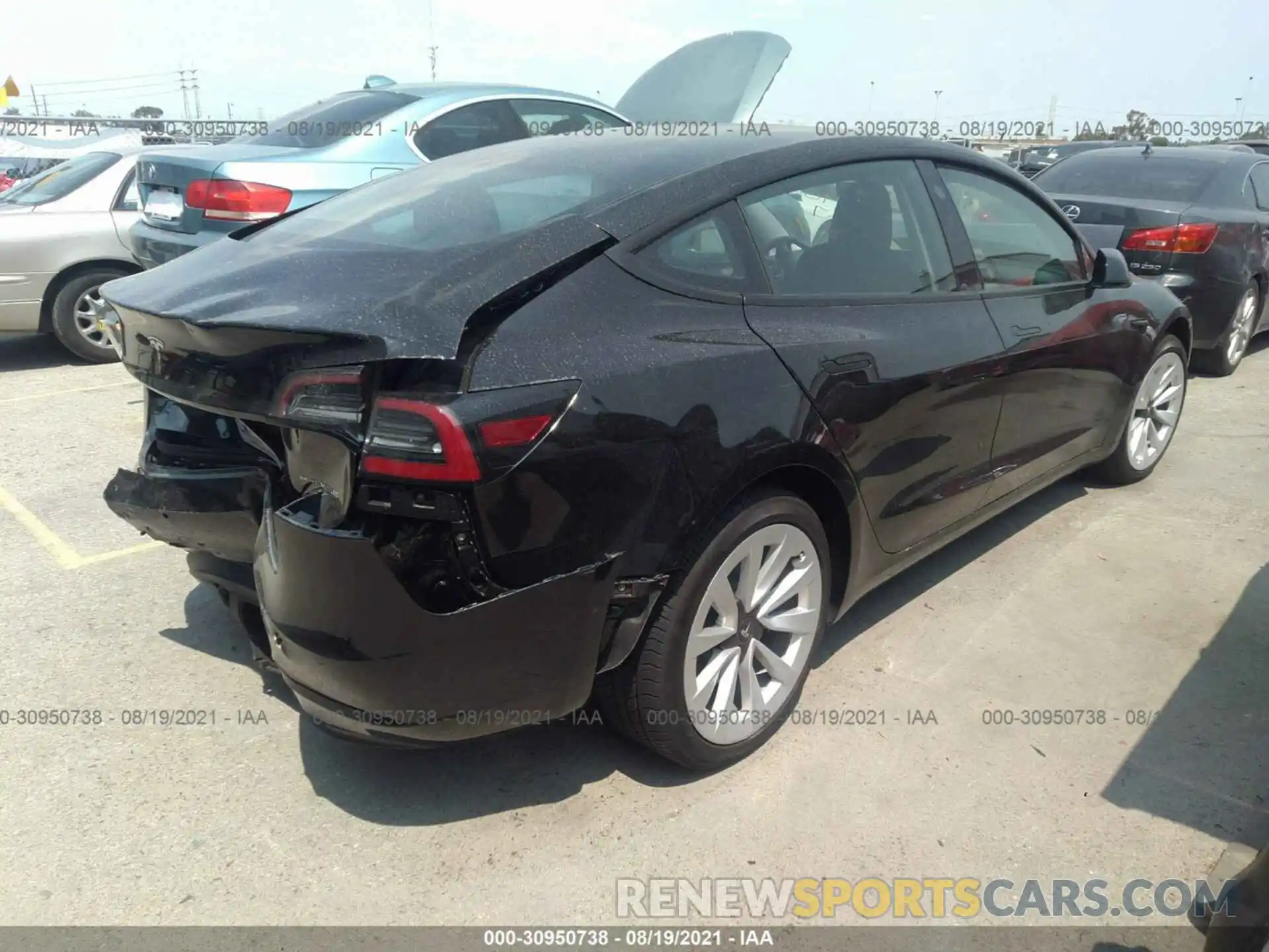 4 Photograph of a damaged car 5YJ3E1EB4MF974960 TESLA MODEL 3 2021