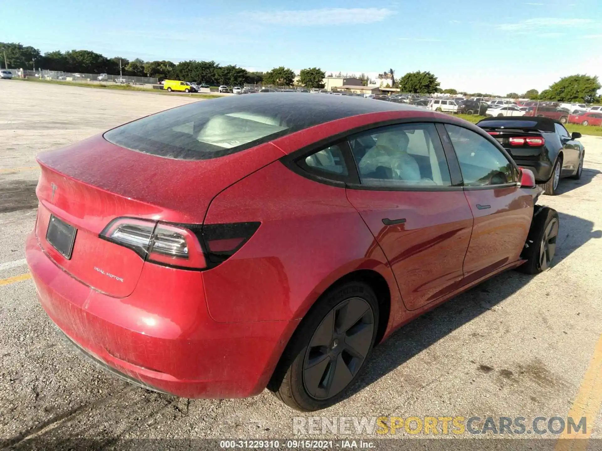 4 Photograph of a damaged car 5YJ3E1EB4MF981357 TESLA MODEL 3 2021