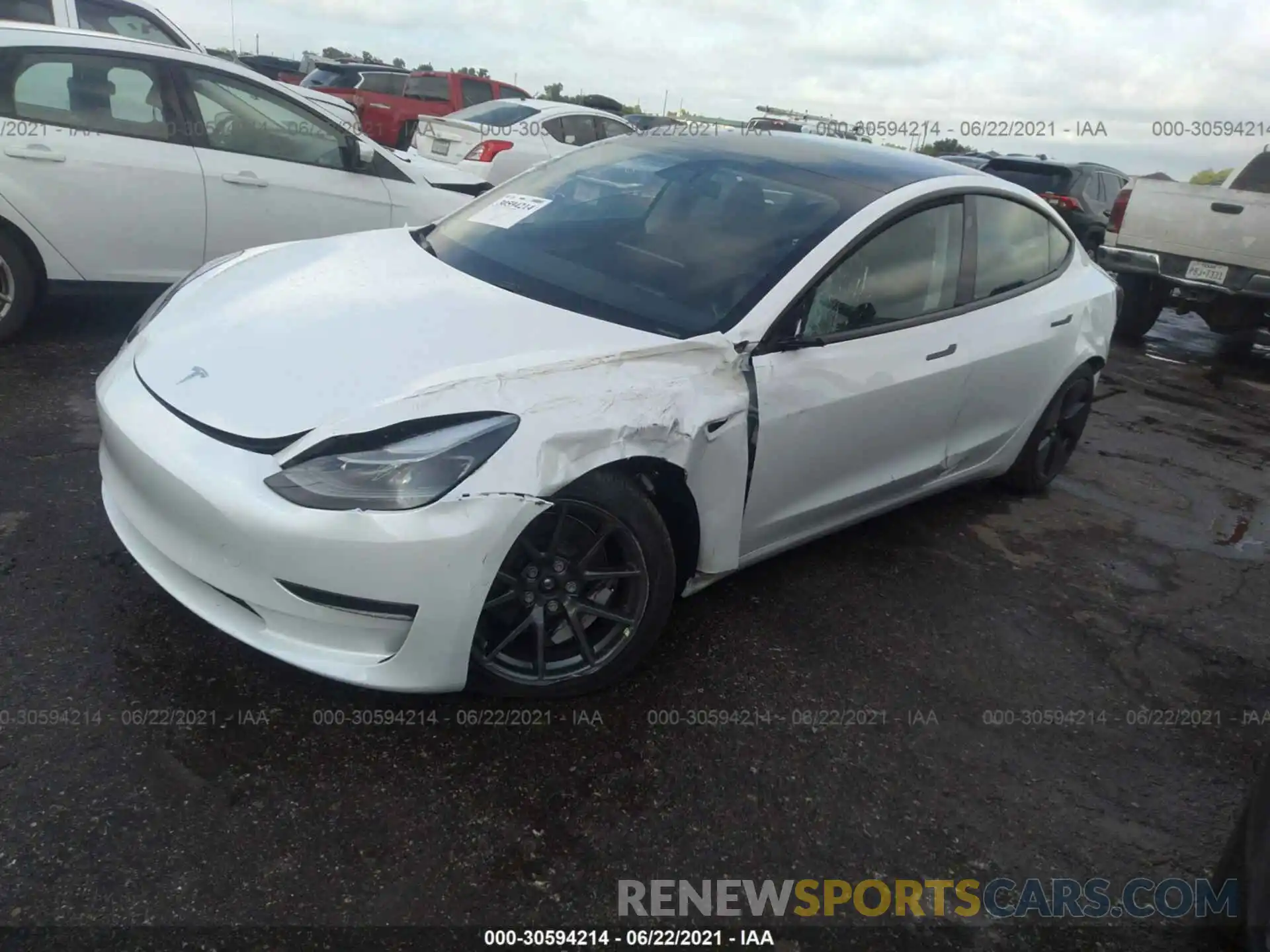 2 Photograph of a damaged car 5YJ3E1EB4MF983433 TESLA MODEL 3 2021