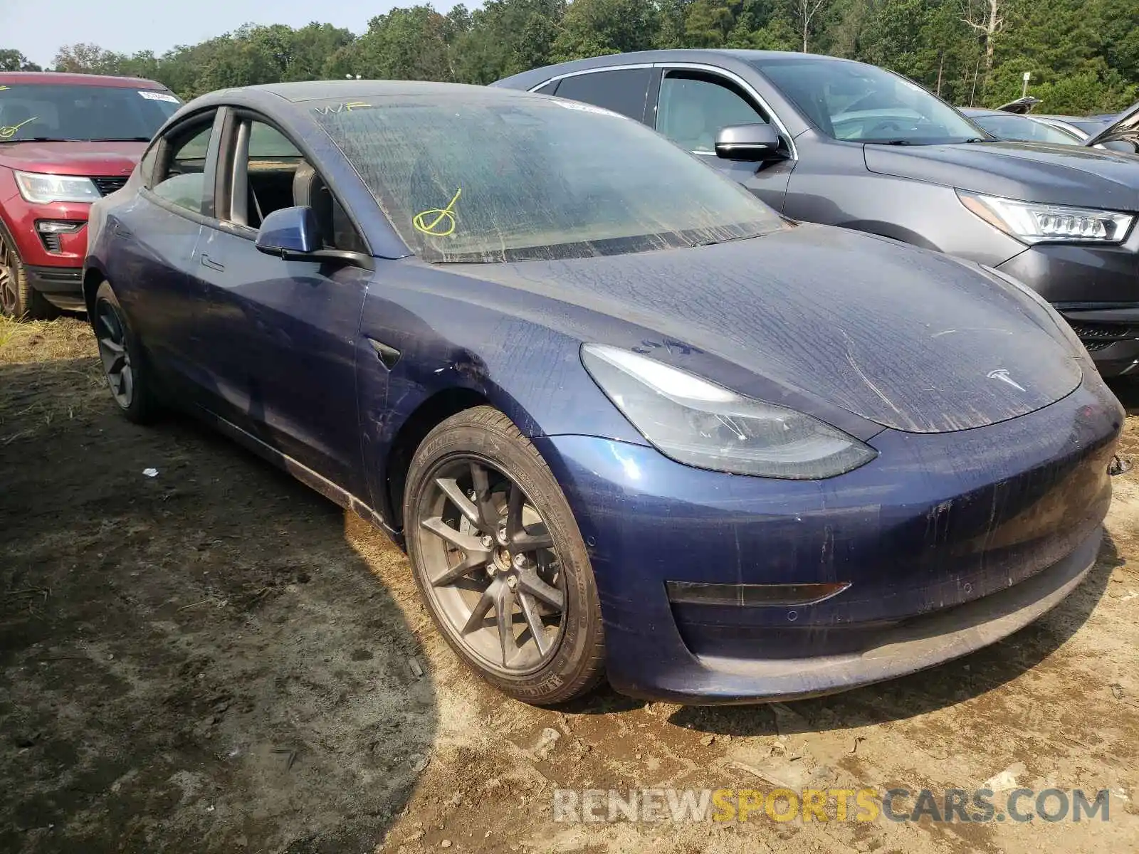 1 Photograph of a damaged car 5YJ3E1EB4MF992701 TESLA MODEL 3 2021