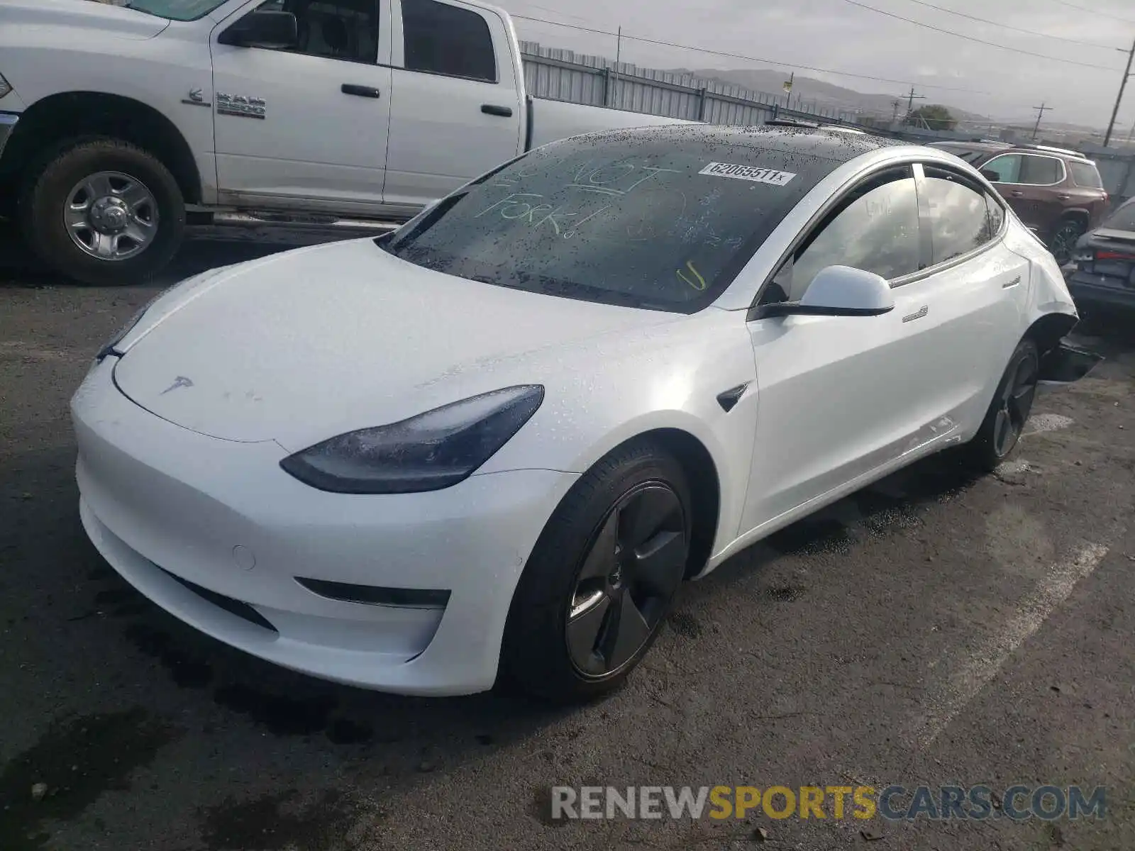 2 Фотография поврежденного автомобиля 5YJ3E1EB4MF999079 TESLA MODEL 3 2021