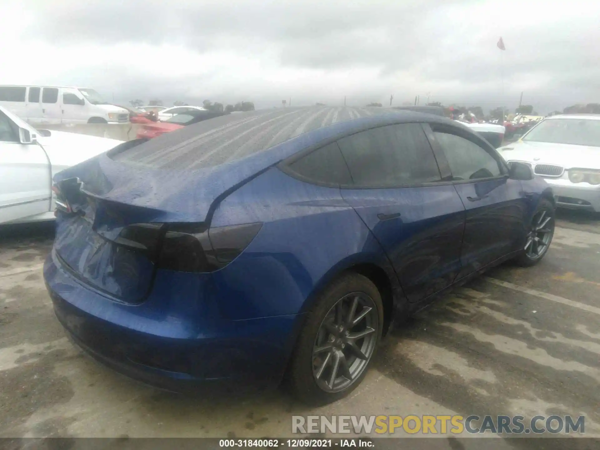 4 Photograph of a damaged car 5YJ3E1EB5MF006625 TESLA MODEL 3 2021