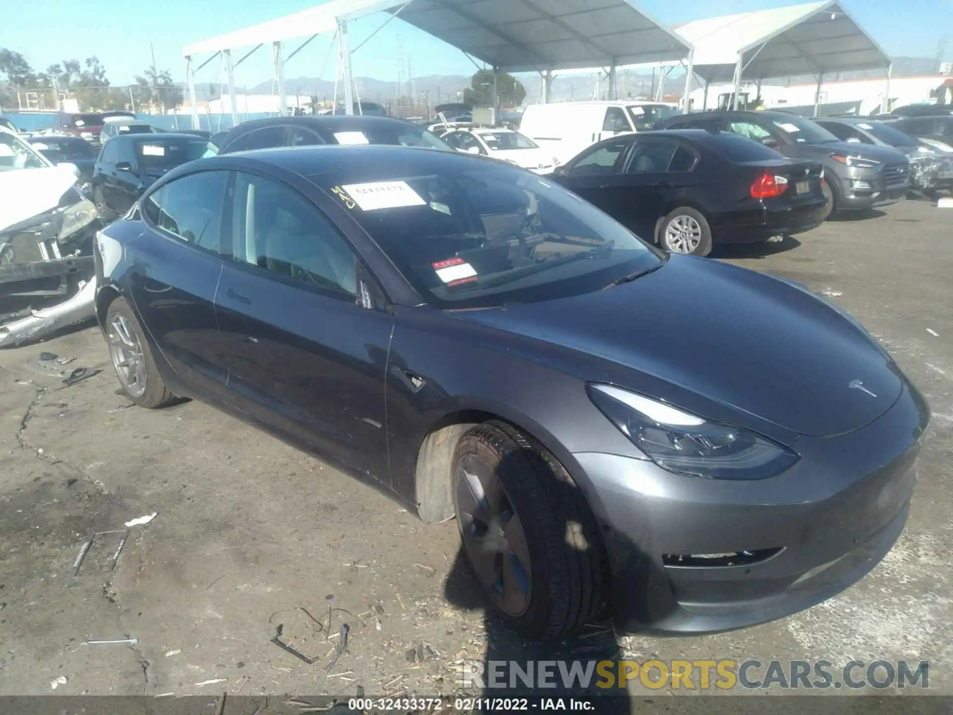 1 Photograph of a damaged car 5YJ3E1EB5MF006799 TESLA MODEL 3 2021