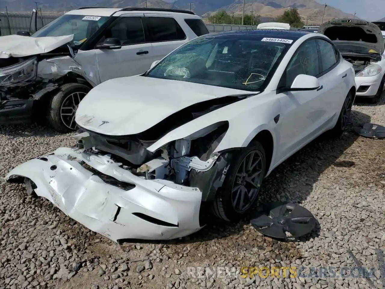 2 Photograph of a damaged car 5YJ3E1EB5MF079879 TESLA MODEL 3 2021